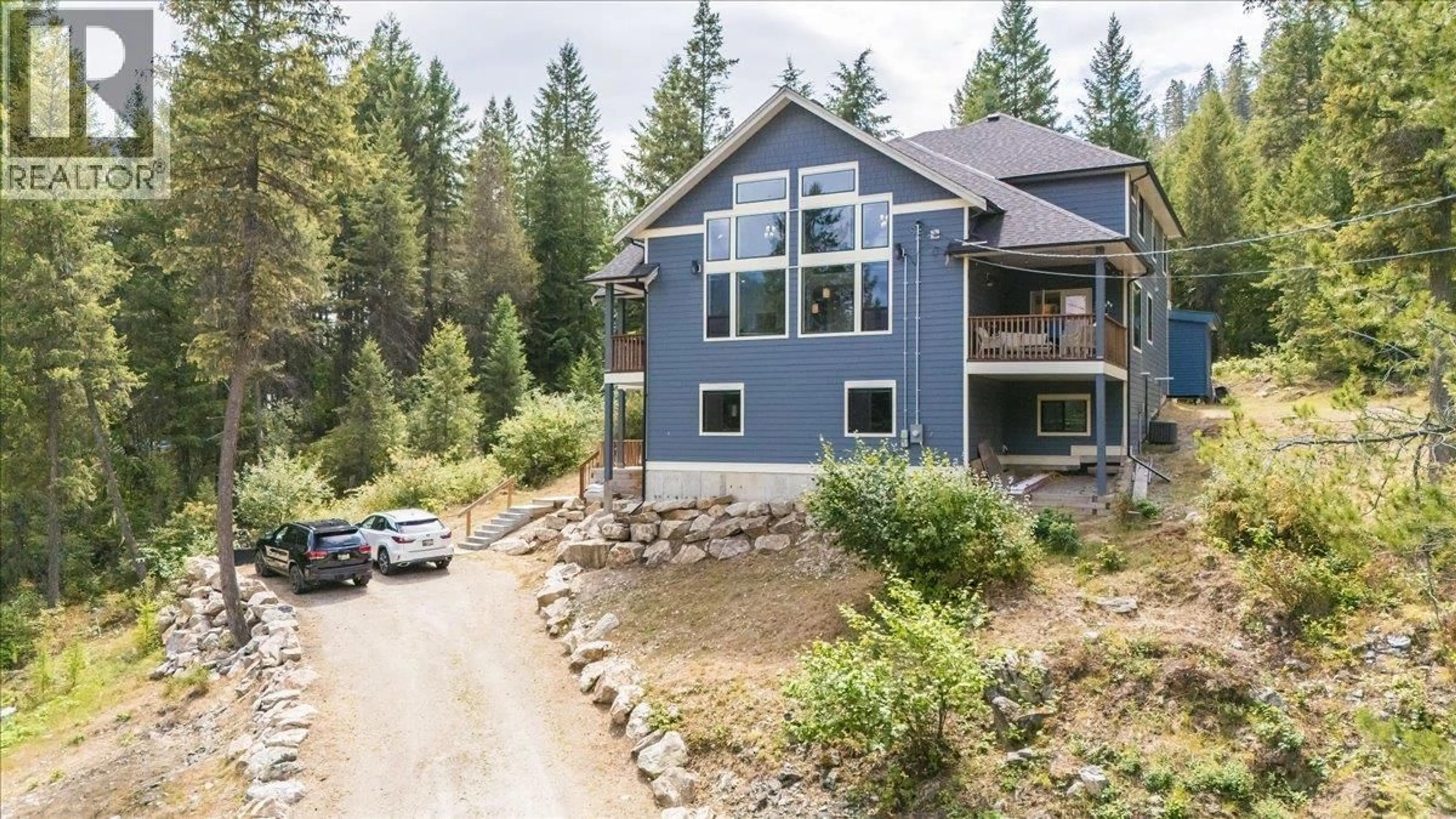 A pic from outside/outdoor area/front of a property/back of a property/a pic from drone, mountain view for 220 CHASE ROAD, Christina Lake British Columbia V0H1E0