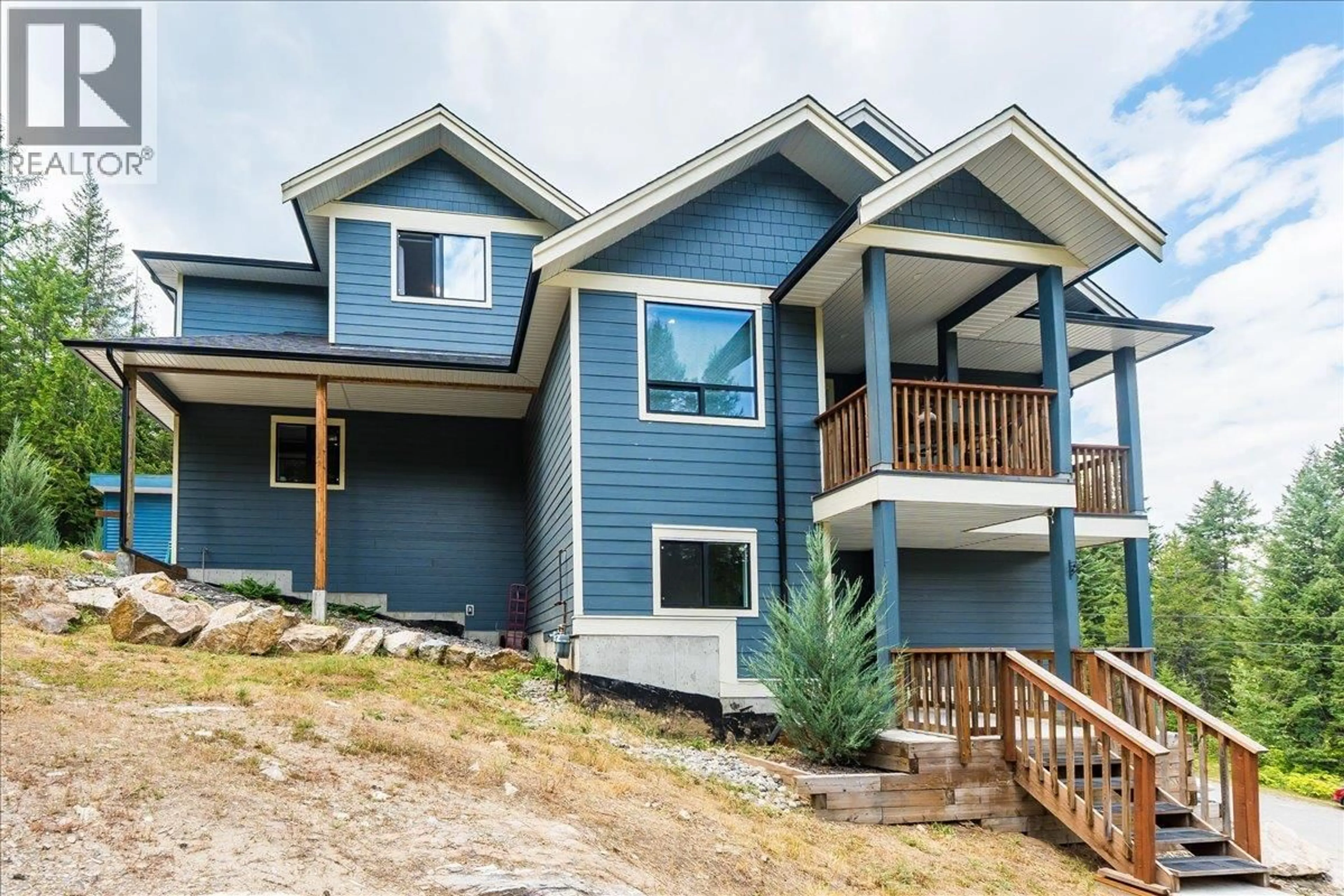 Home with vinyl exterior material, mountain view for 220 CHASE ROAD, Christina Lake British Columbia V0H1E0