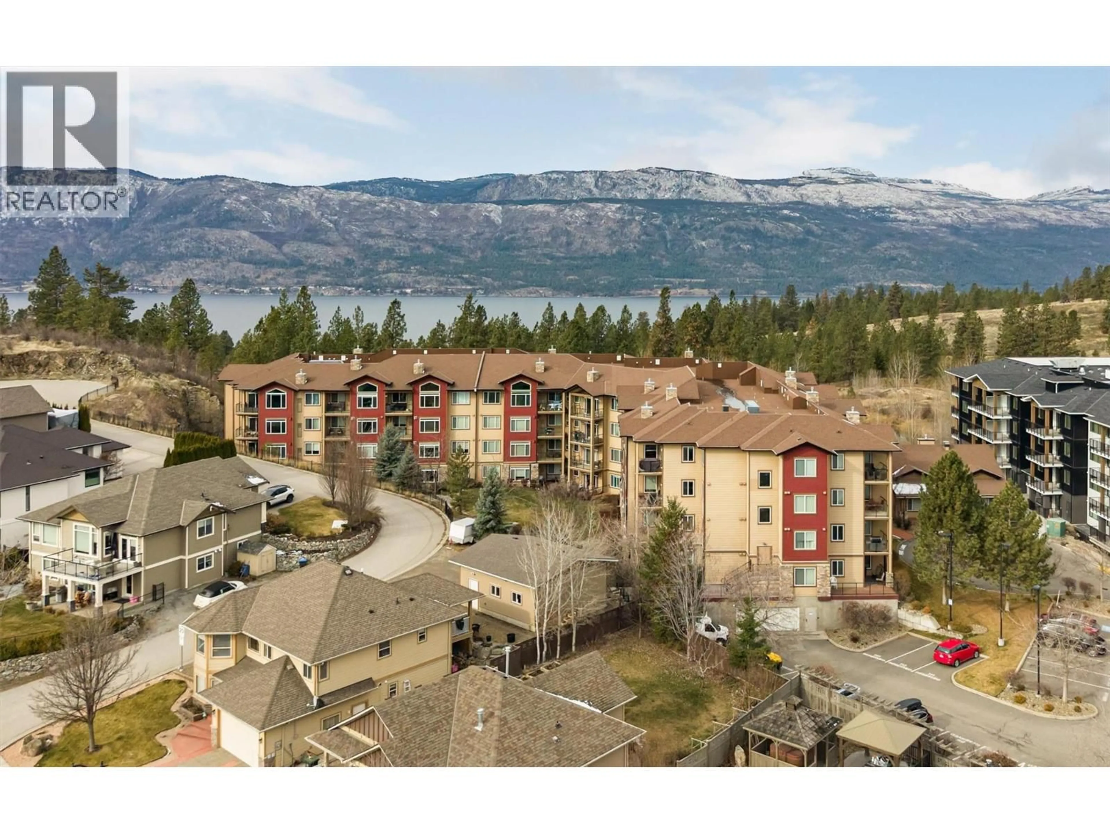 A pic from outside/outdoor area/front of a property/back of a property/a pic from drone, mountain view for 214 - 2532 SHORELINE DRIVE, Lake Country British Columbia V4V2R6