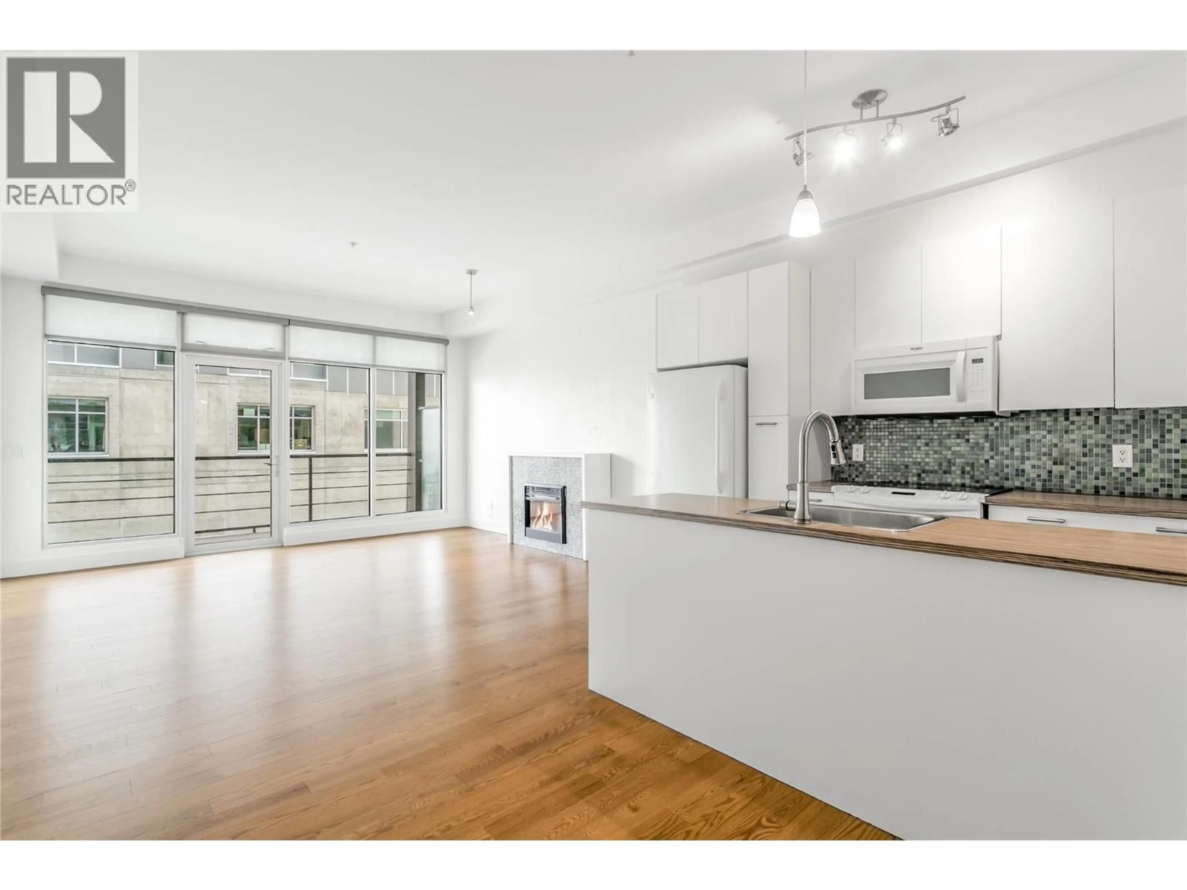 Open concept kitchen, unknown for 312 - 1289 ELLIS STREET, Kelowna British Columbia V1Y9X6