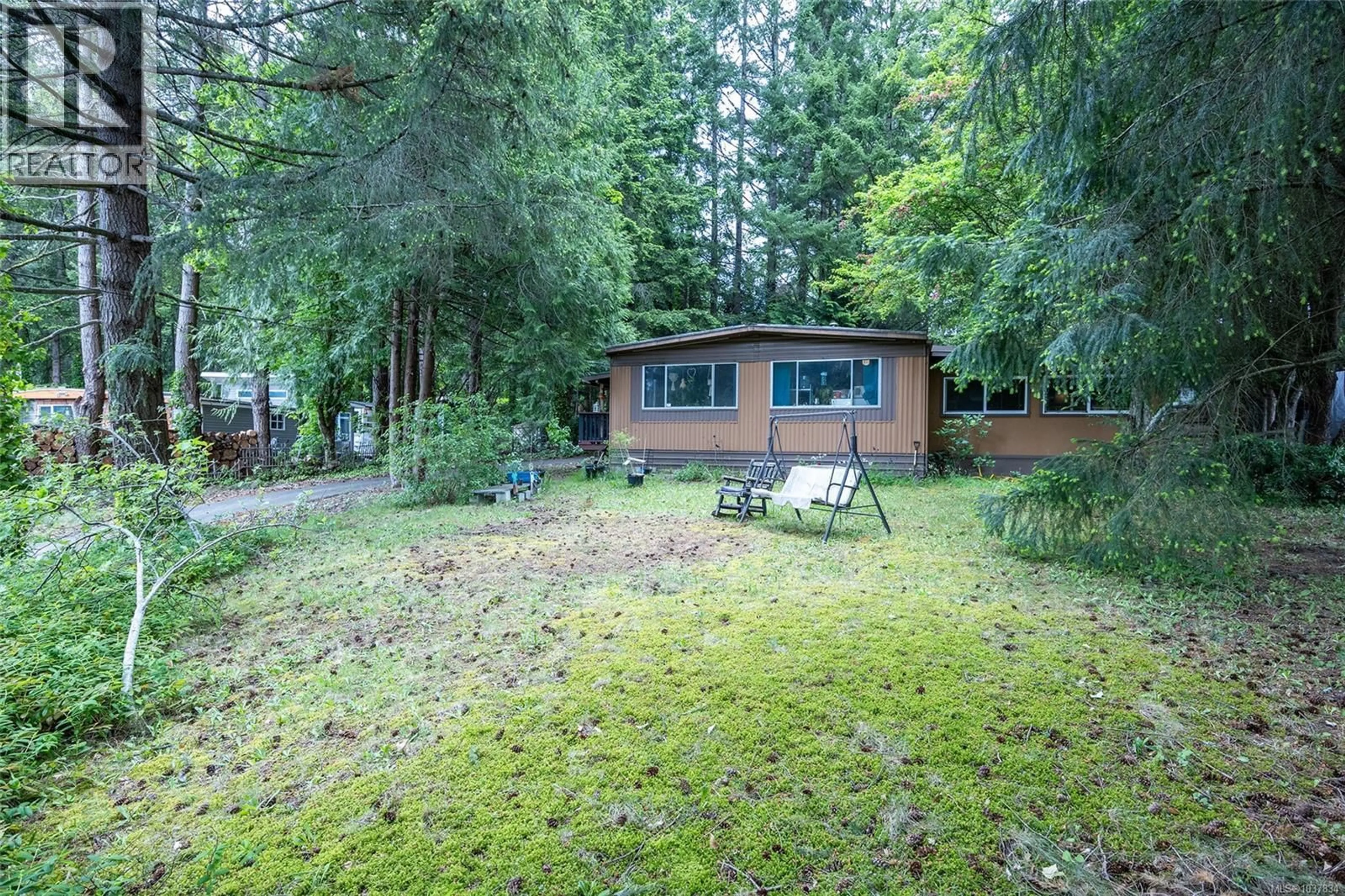 A pic from outside/outdoor area/front of a property/back of a property/a pic from drone, forest/trees view for 5676 BIG BEAR RIDGE, Nanaimo British Columbia V9T2K2