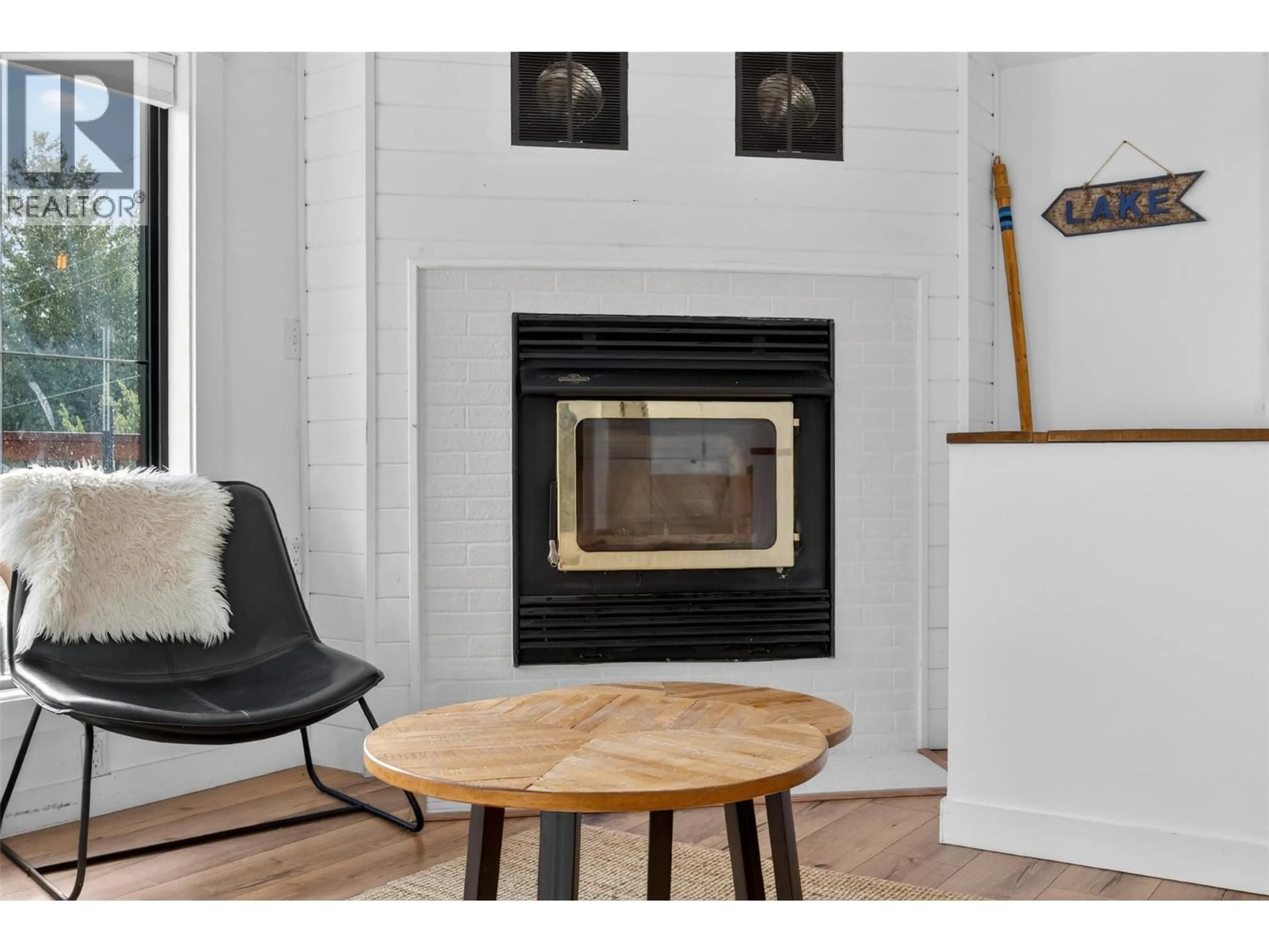 Living room with furniture, wood/laminate floor for 4962 TIMBERVIEW PLACE, Windermere British Columbia V0A1K3