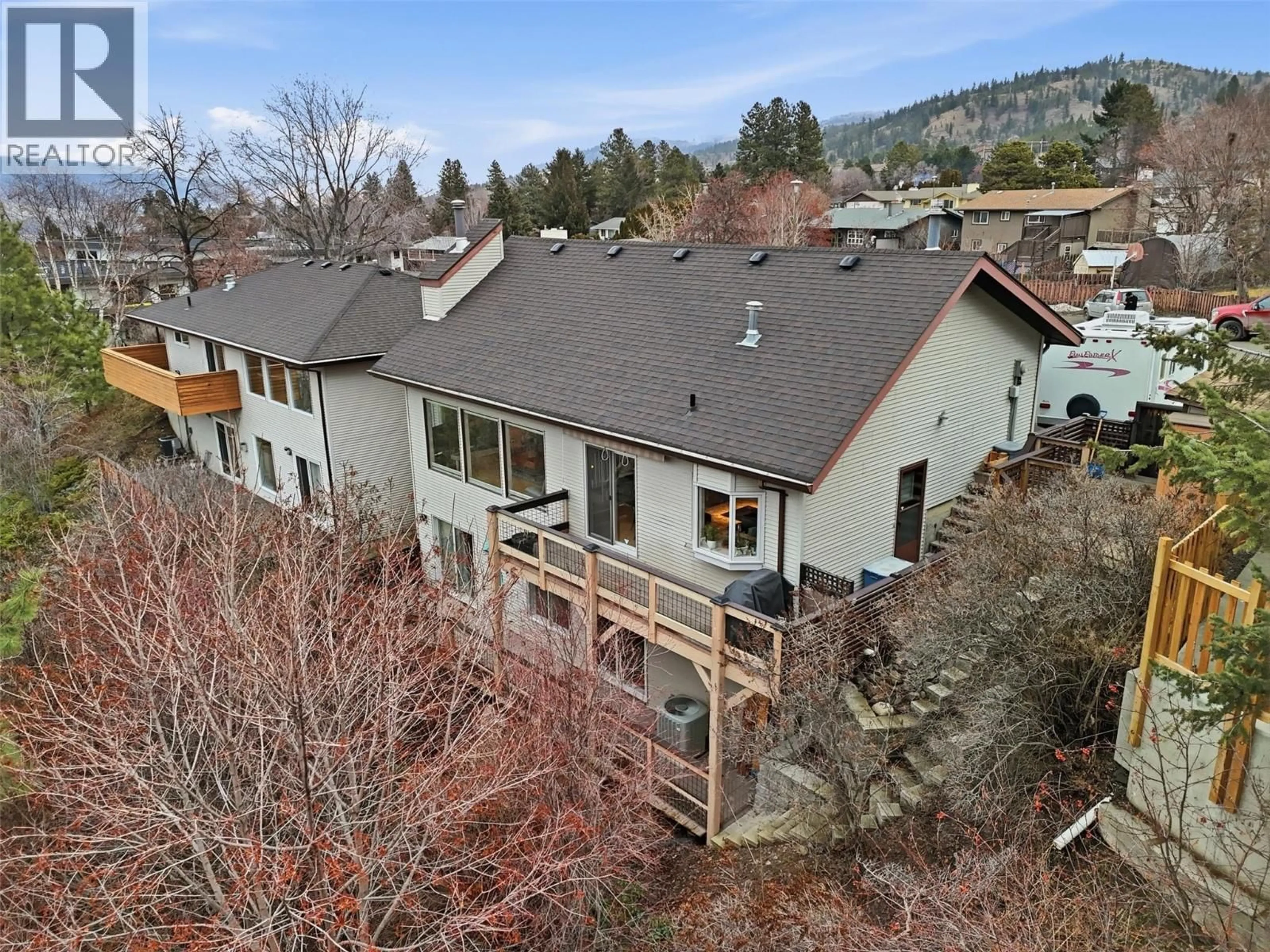 A pic from outside/outdoor area/front of a property/back of a property/a pic from drone, mountain view for 328 WHITESHIELD CRESCENT, Kamloops British Columbia V2E1G3
