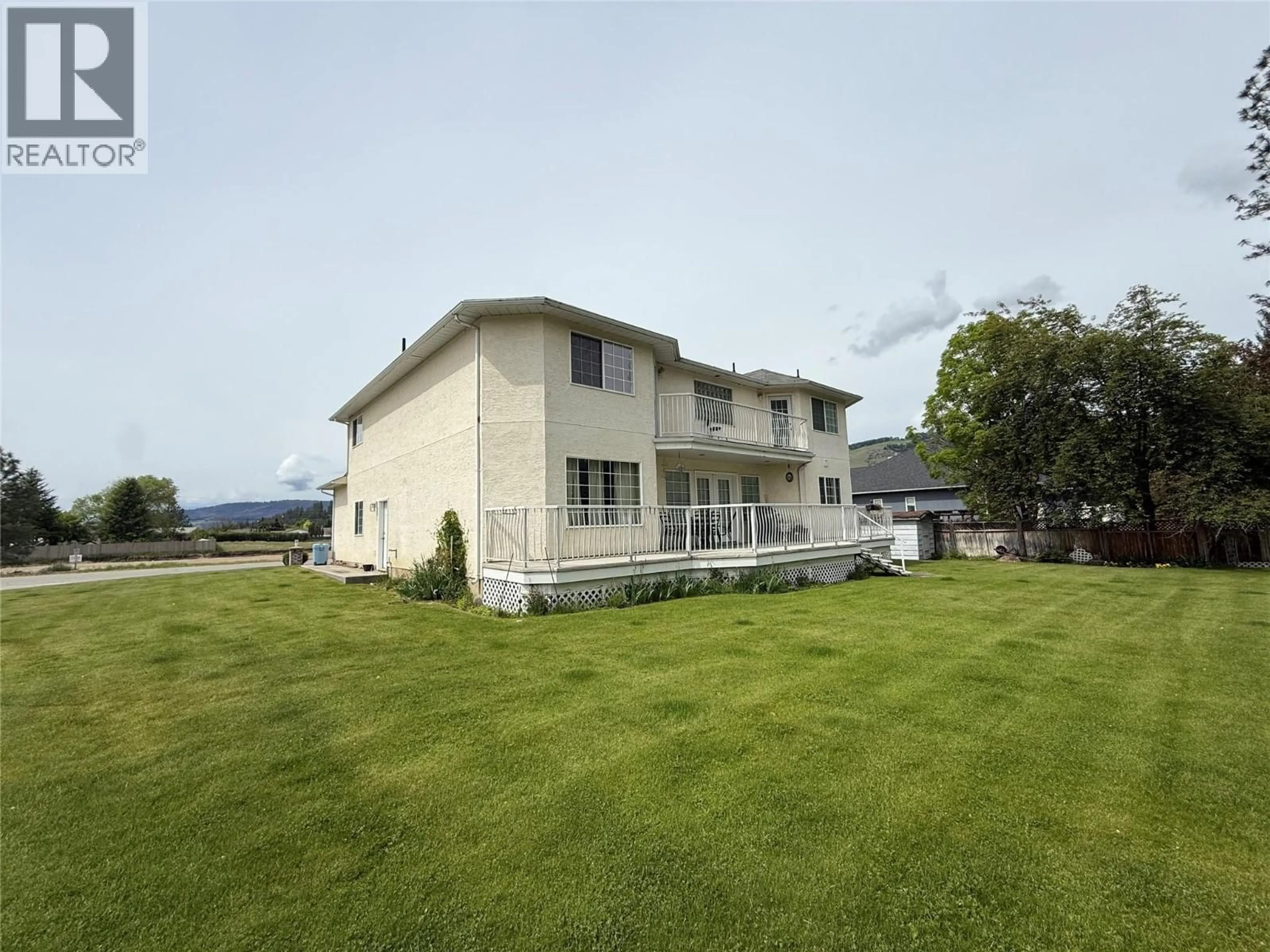 A pic from outside/outdoor area/front of a property/back of a property/a pic from drone, mountain view for 7760 COLUMBIA DRIVE, Grand Forks British Columbia V0H1H2