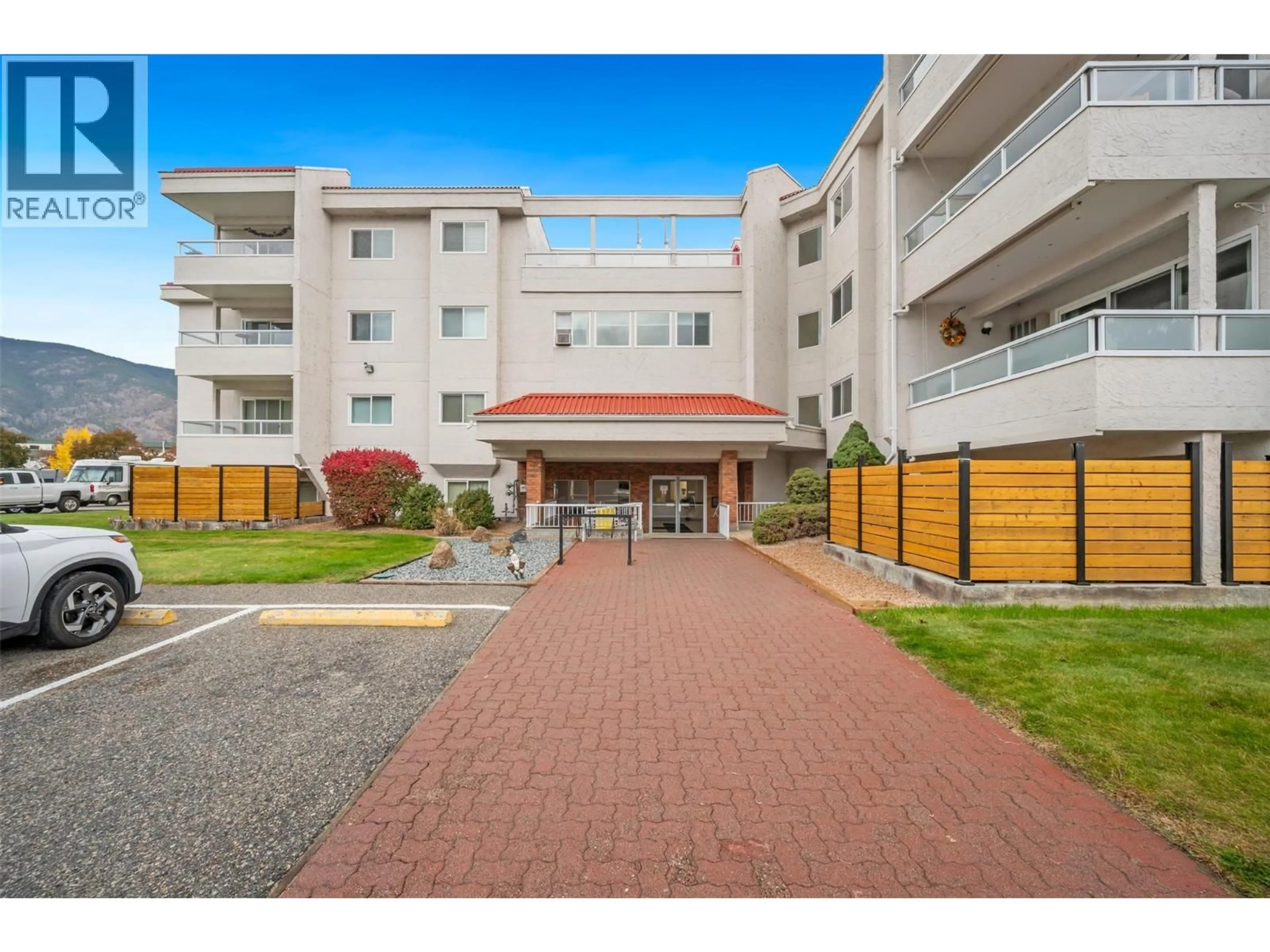 A pic from outside/outdoor area/front of a property/back of a property/a pic from drone, unknown for 404 - 284 YORKTON AVENUE, Penticton British Columbia V2A3V5