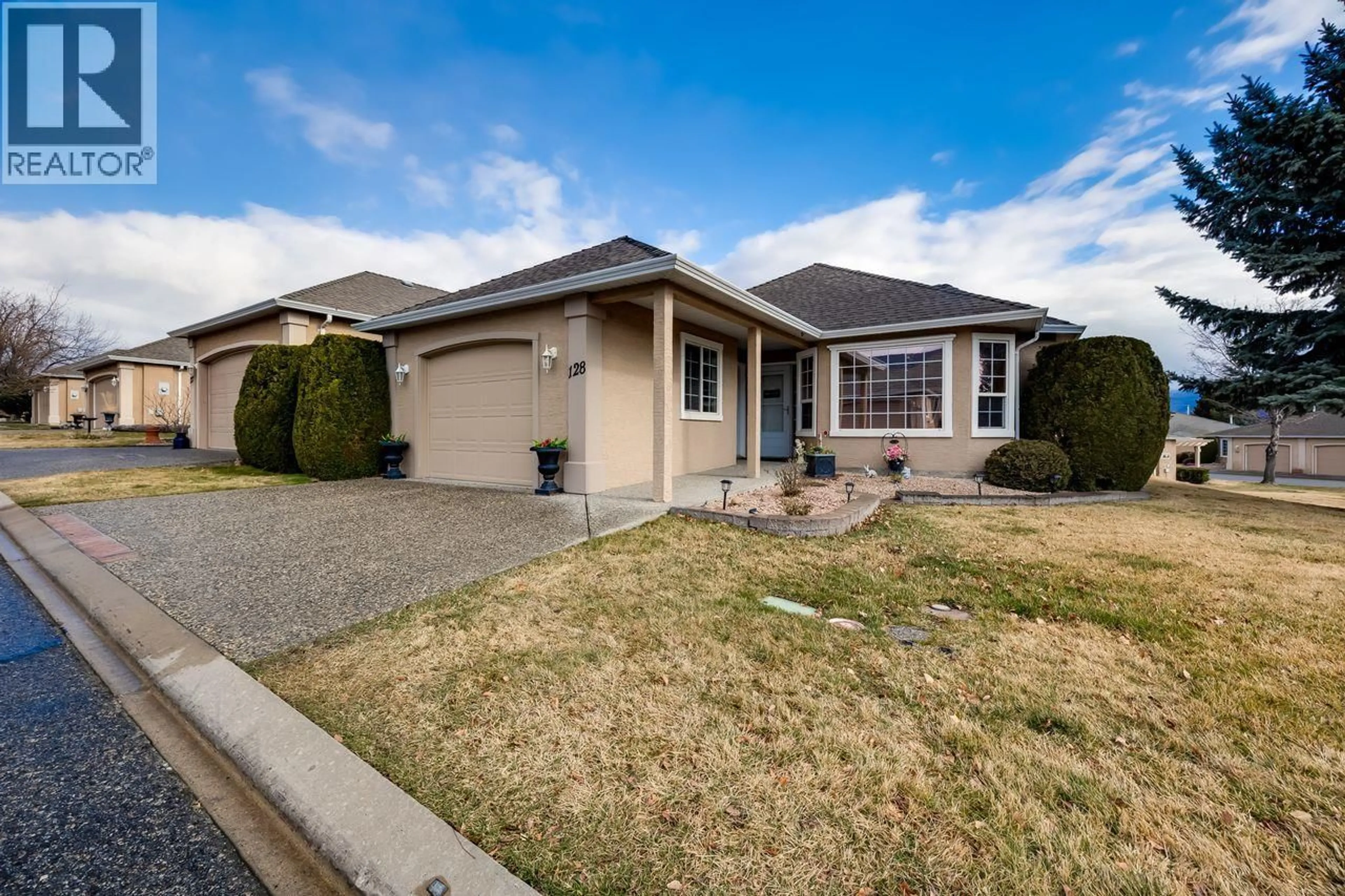 Home with vinyl exterior material, street for 128 - 2250 LOUIE DRIVE, Westbank British Columbia V4T2M6