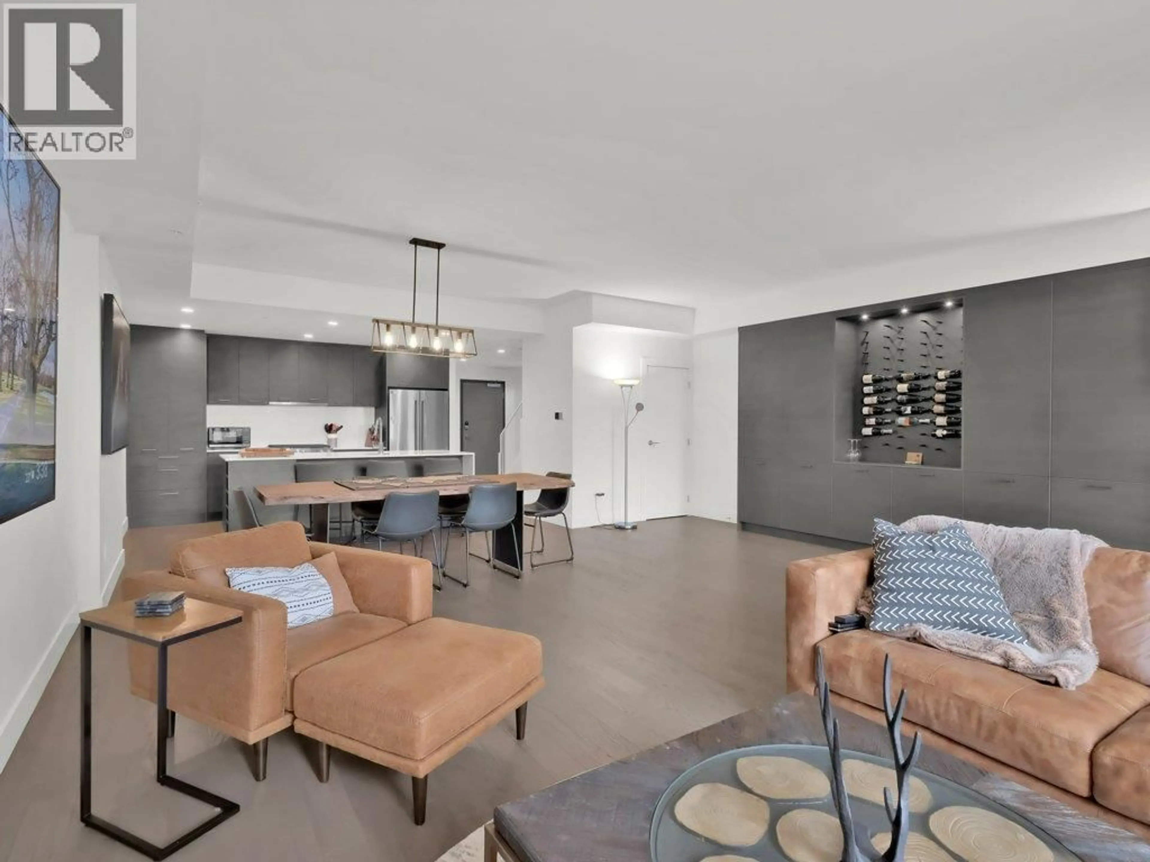 Living room with furniture, unknown for 401 - 1191 SUNSET DRIVE, Kelowna British Columbia V1Y9Z5