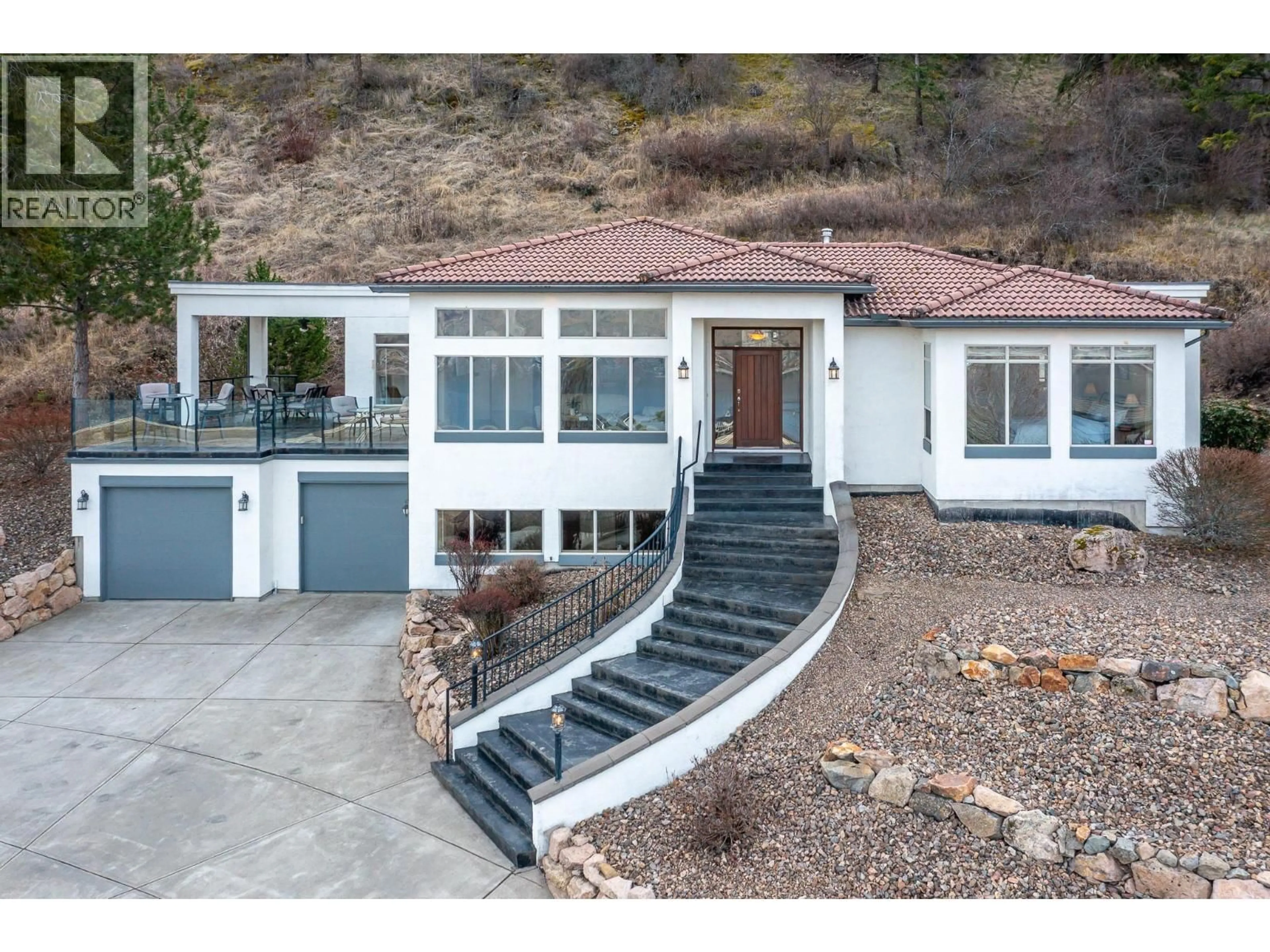 Home with vinyl exterior material, street for 200 MELROSE COURT, Vernon British Columbia V1H1T7