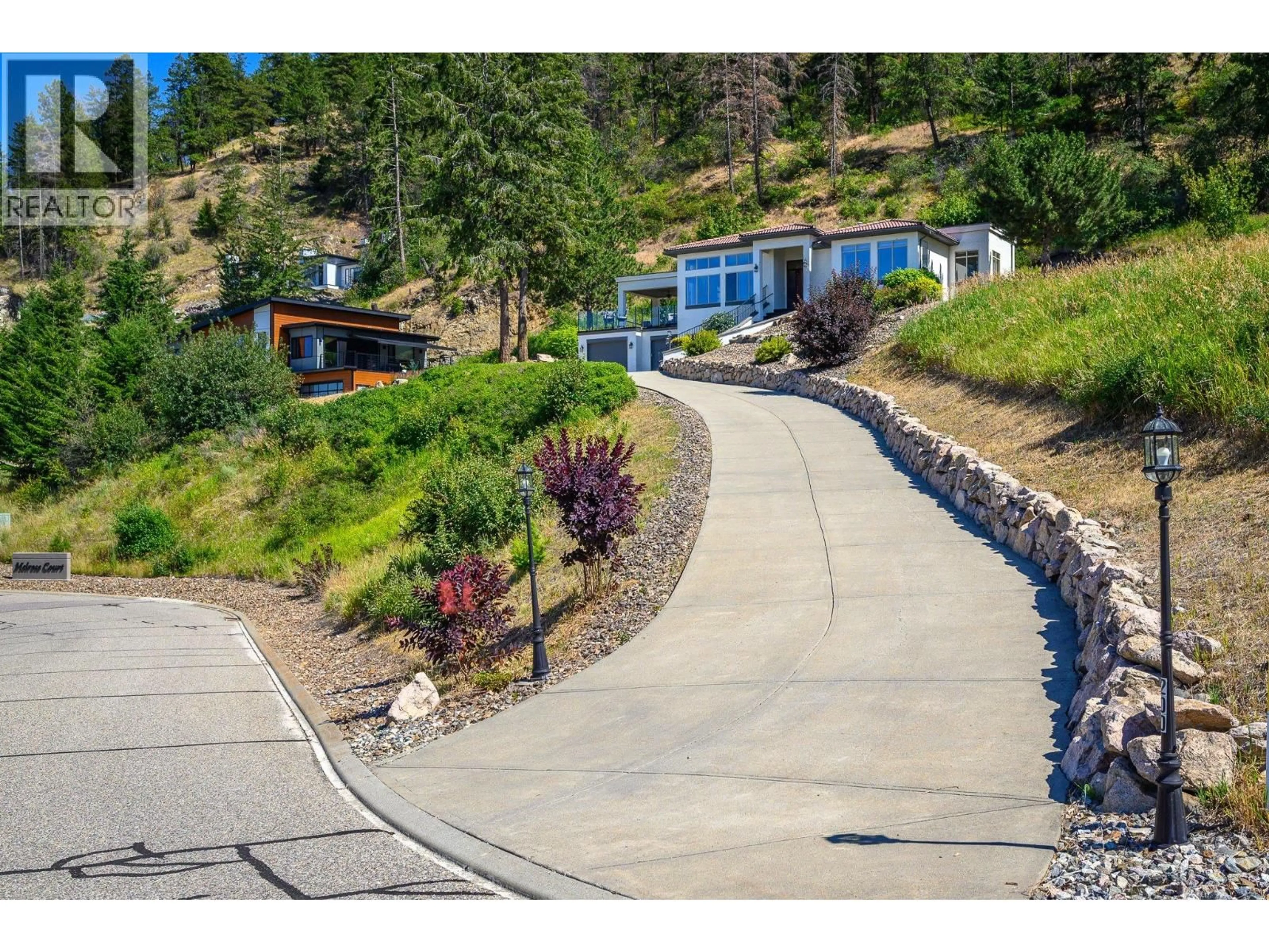 A pic from outside/outdoor area/front of a property/back of a property/a pic from drone, street for 200 MELROSE COURT, Vernon British Columbia V1H1T7