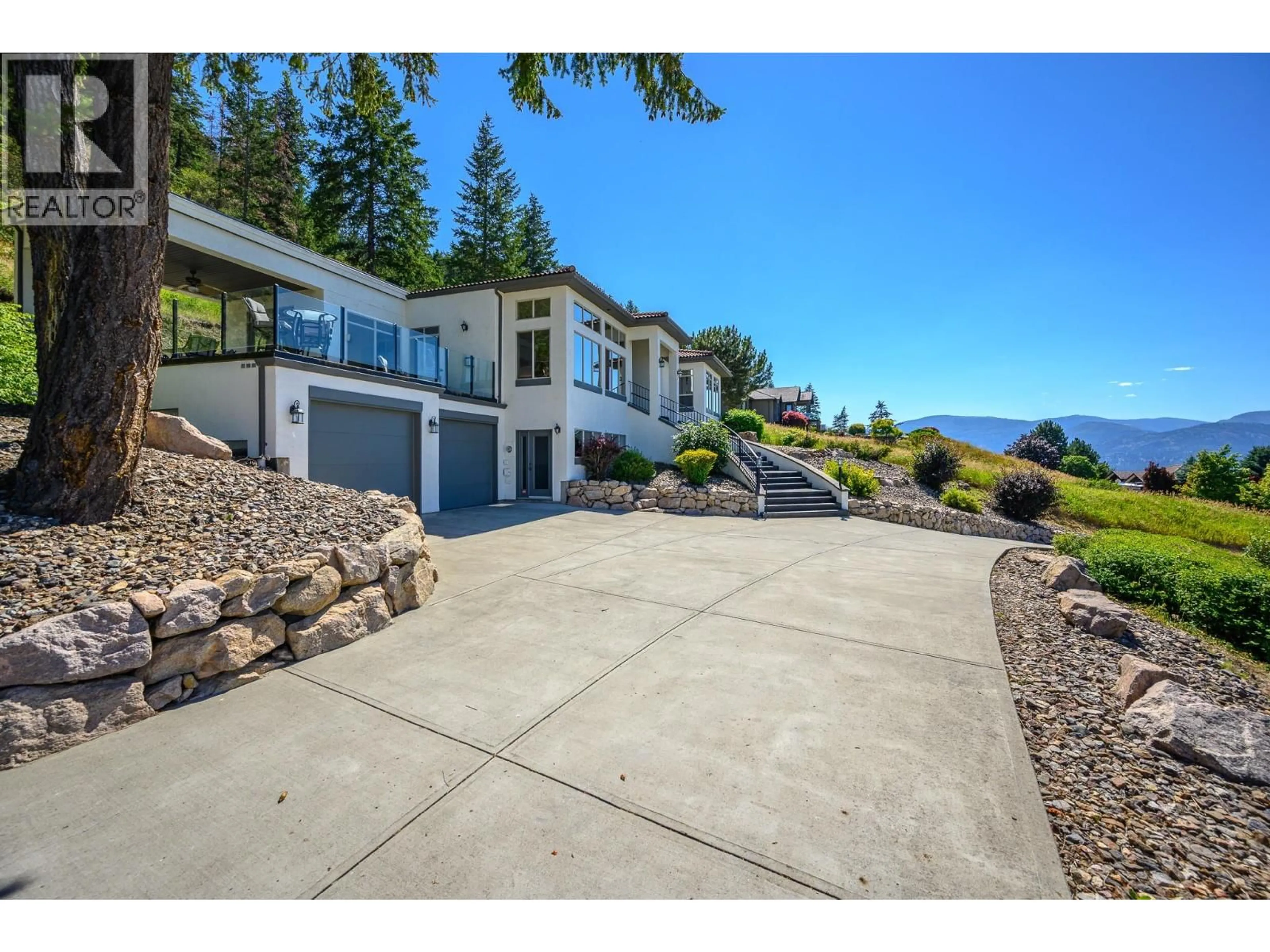 A pic from outside/outdoor area/front of a property/back of a property/a pic from drone, water/lake/river/ocean view for 200 MELROSE COURT, Vernon British Columbia V1H1T7