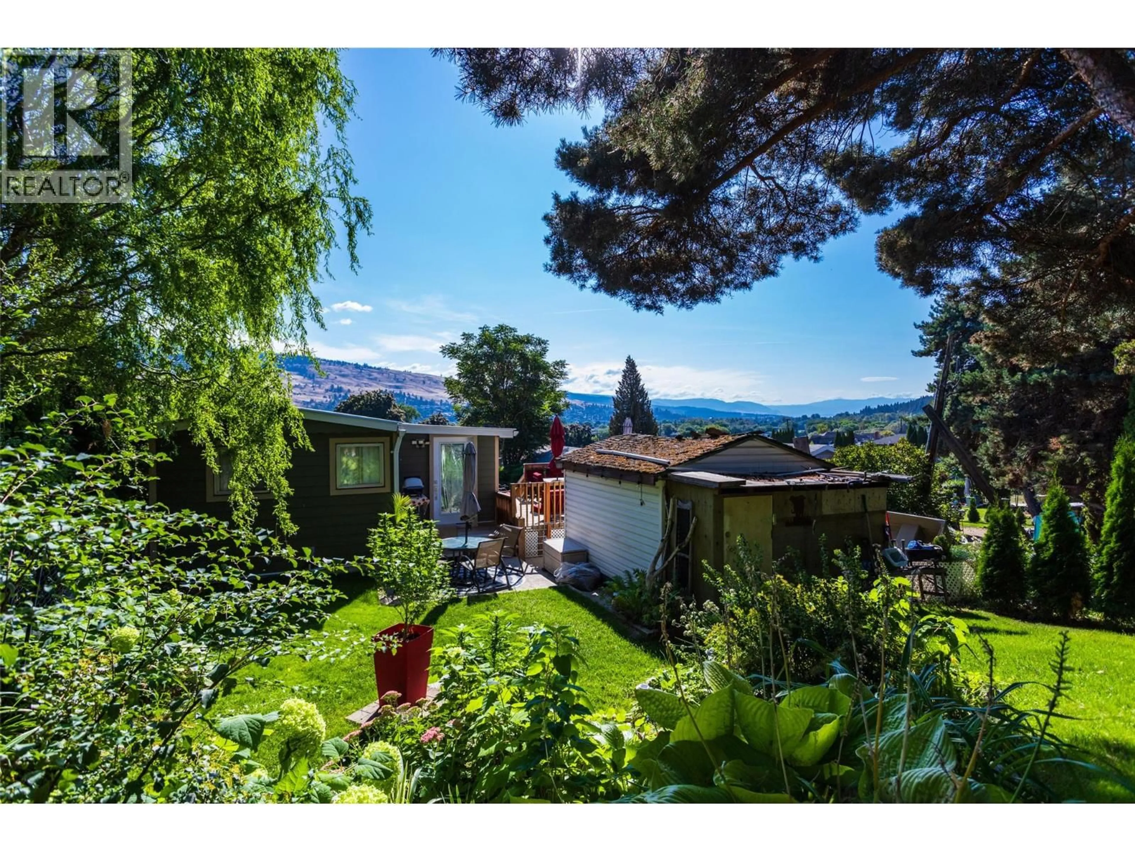 A pic from outside/outdoor area/front of a property/back of a property/a pic from drone, mountain view for 6 - 12022 PRETTY ROAD, Lake Country British Columbia V4V2E3