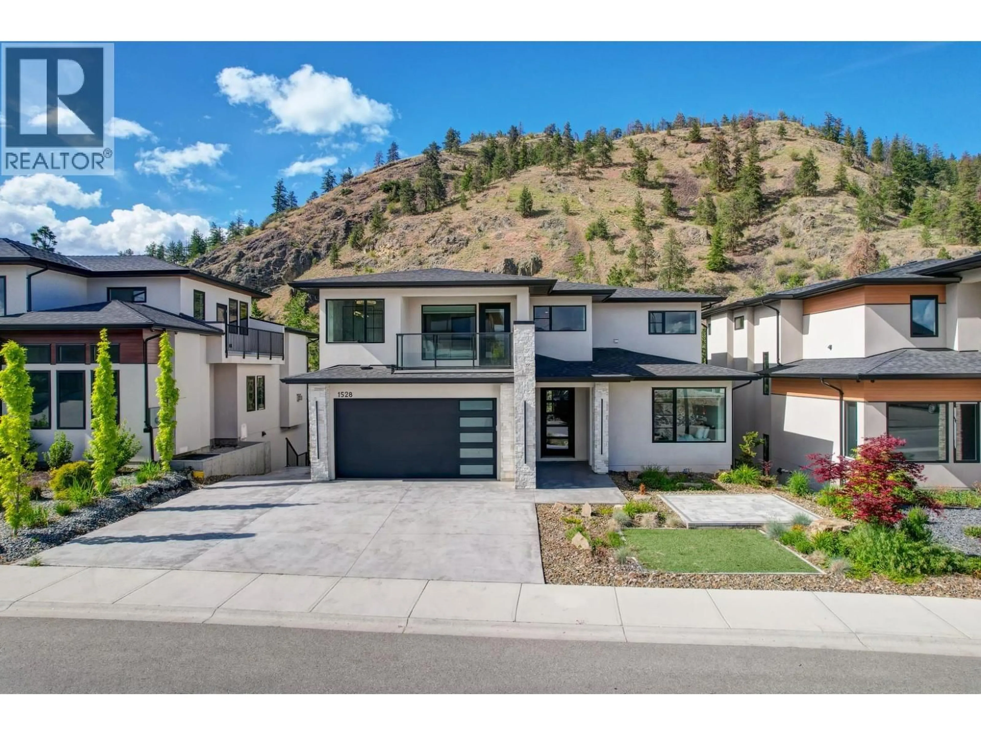 Home with vinyl exterior material, mountain view for 1528 CABERNET WAY, West Kelowna British Columbia V4T0E1