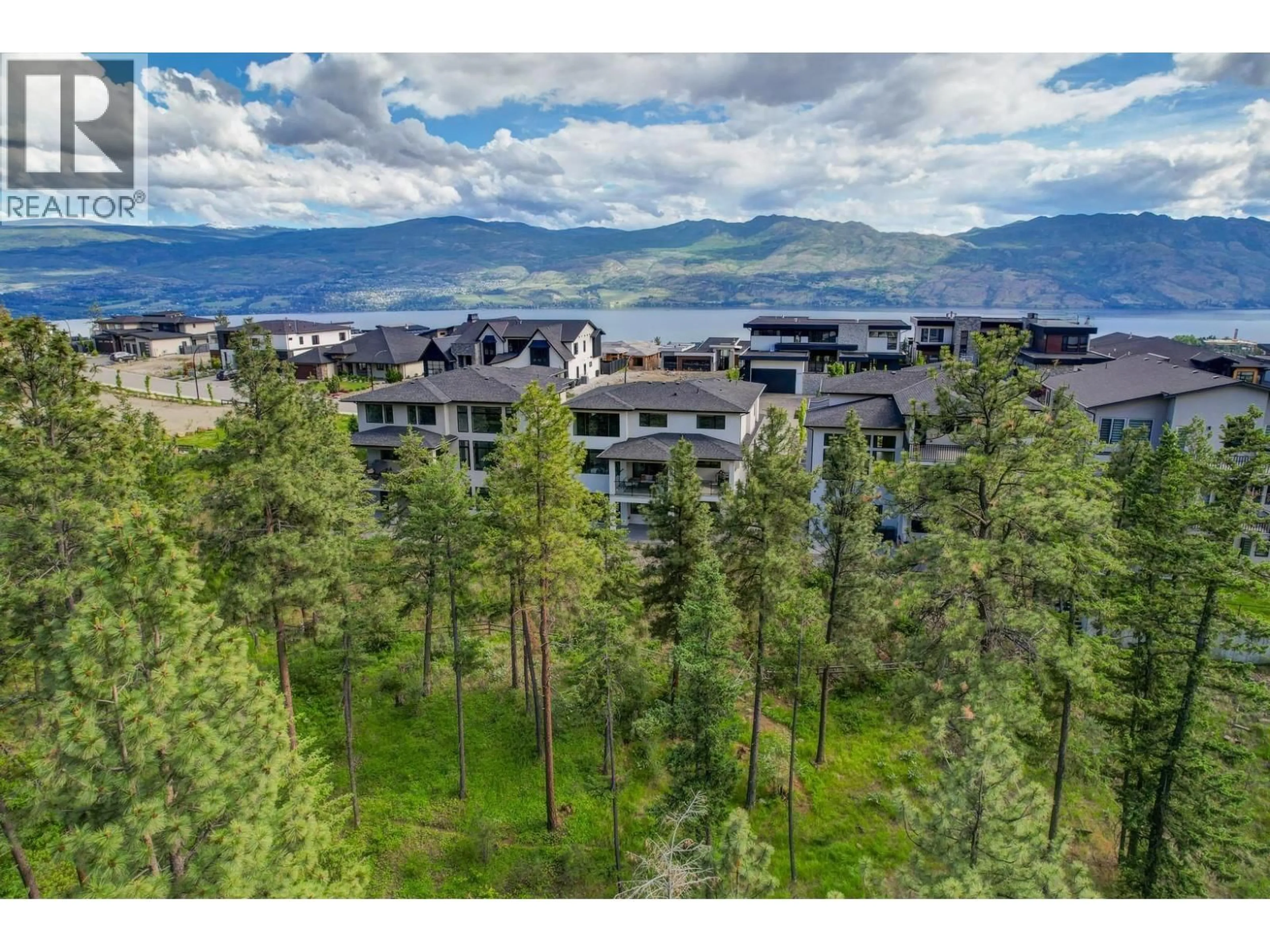 A pic from outside/outdoor area/front of a property/back of a property/a pic from drone, mountain view for 1528 CABERNET WAY, West Kelowna British Columbia V4T0E1
