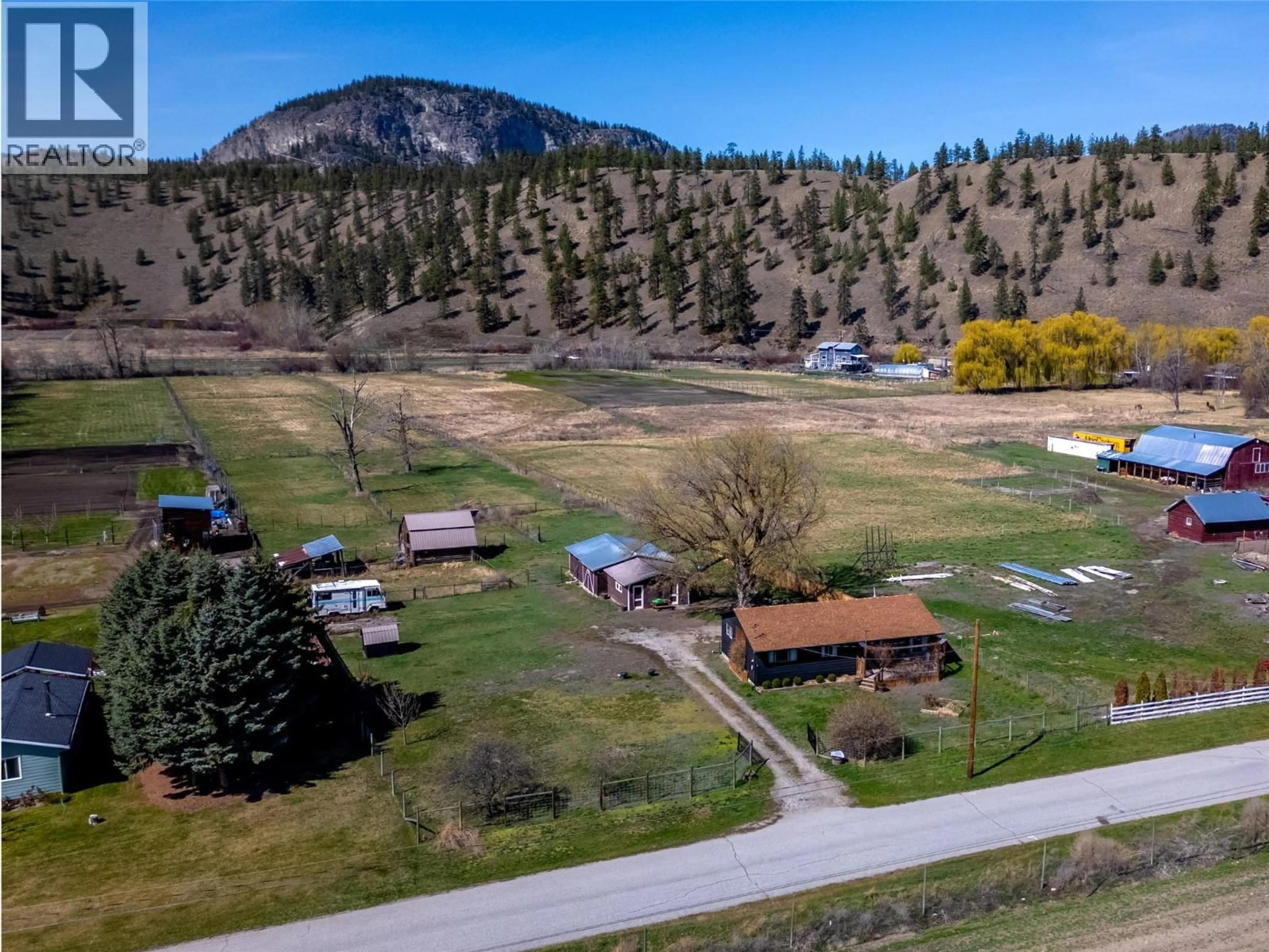 A pic from outside/outdoor area/front of a property/back of a property/a pic from drone, mountain view for 8114 RIVER ROAD, Oliver British Columbia V0H1T7