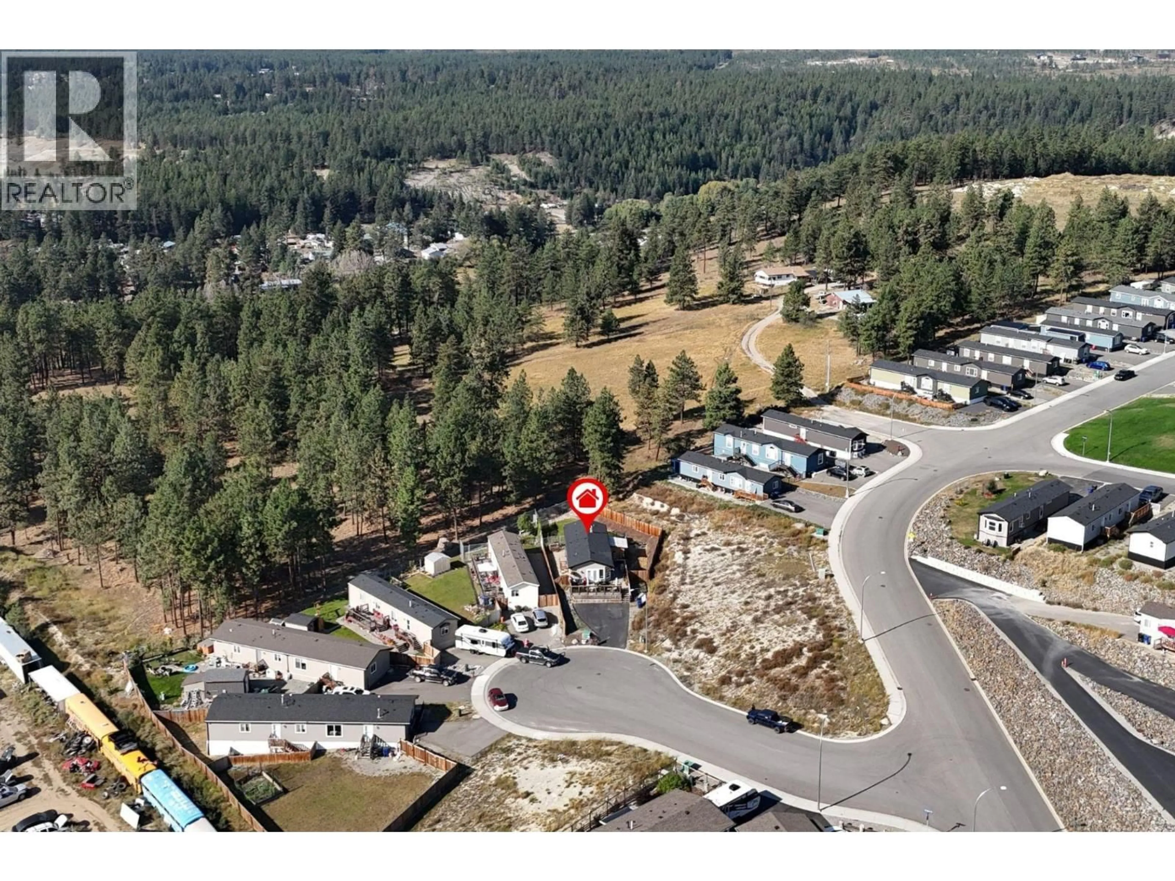 A pic from outside/outdoor area/front of a property/back of a property/a pic from drone, mountain view for 505 STEEPLEVIEW POINT NORTHWEST, Cranbrook British Columbia V1C5L3