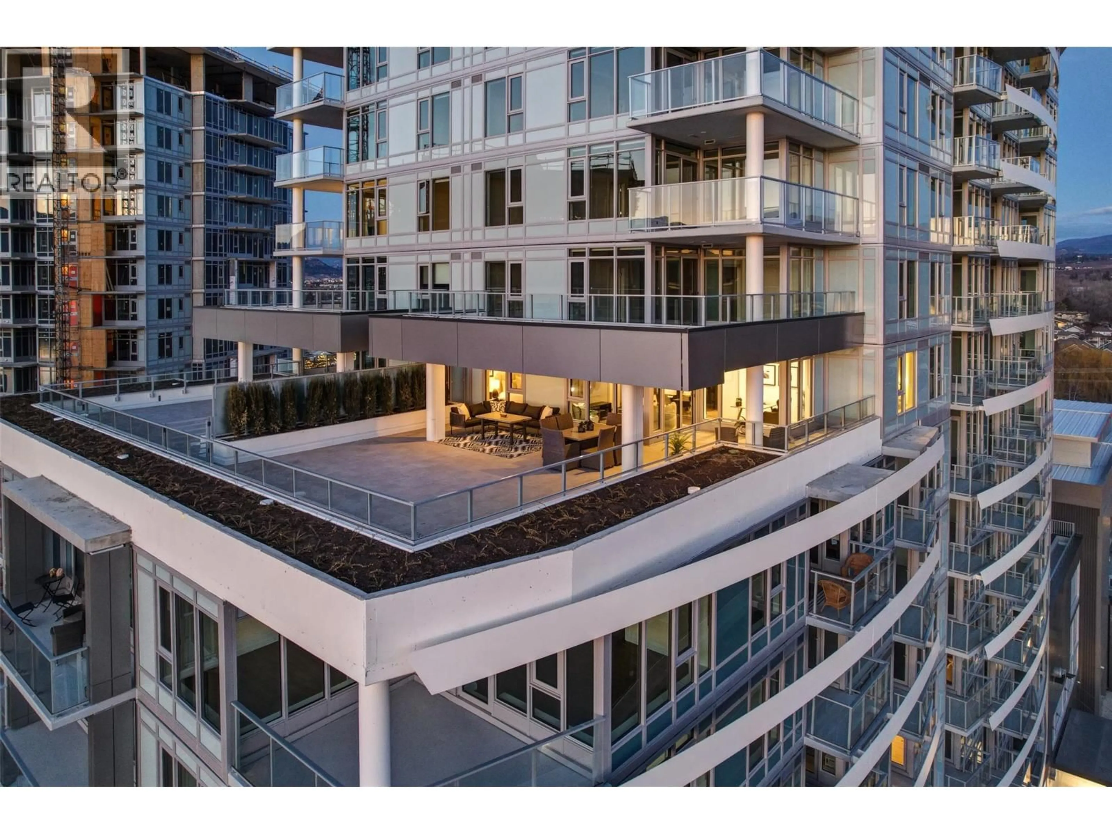 Patio, city buildings view from balcony for 1007 - 3699 CAPOZZI ROAD, Kelowna British Columbia V1W3L2