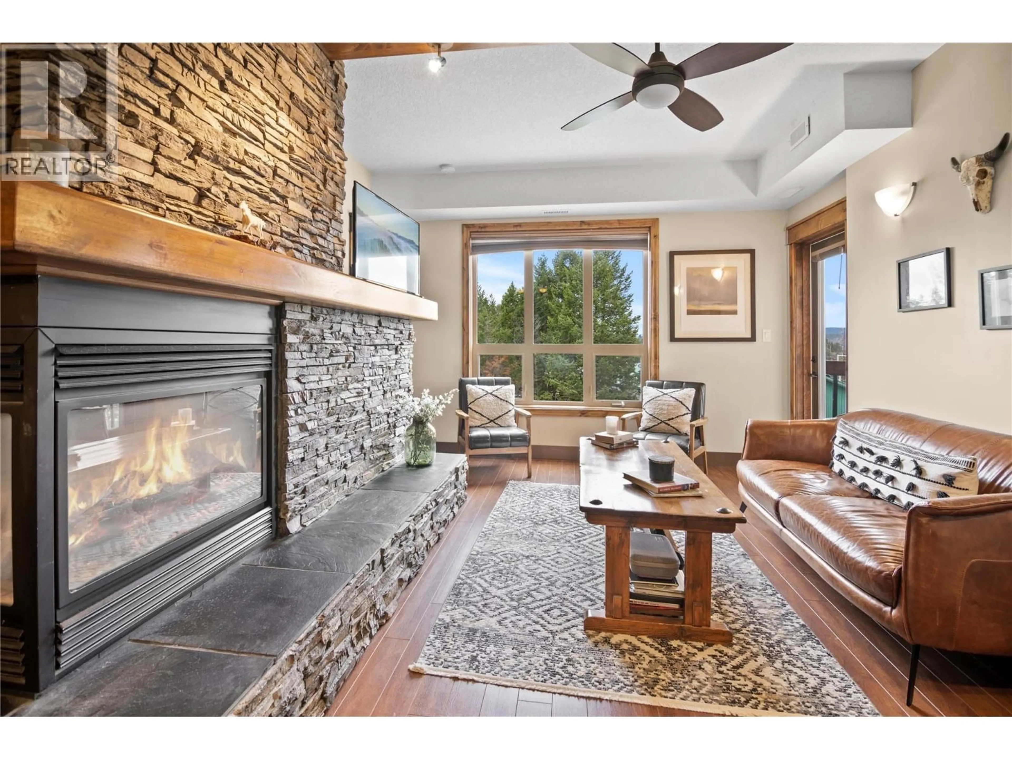 Living room with furniture, ceramic/tile floor for 2206 - 7495 COLUMBIA AVENUE, Radium Hot Springs British Columbia V0A1M0