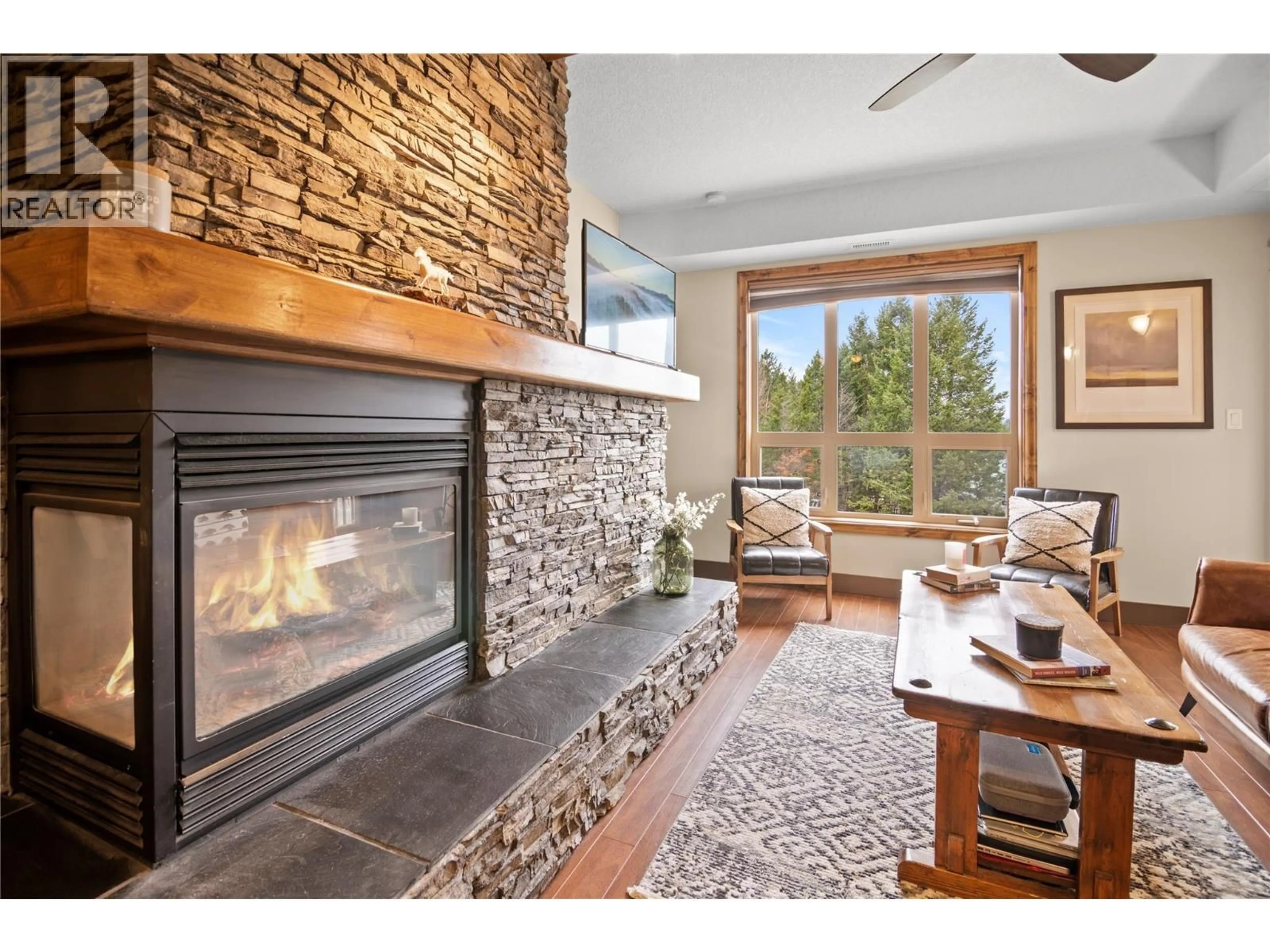 Living room with furniture, ceramic/tile floor for 2206 - 7495 COLUMBIA AVENUE, Radium Hot Springs British Columbia V0A1M0