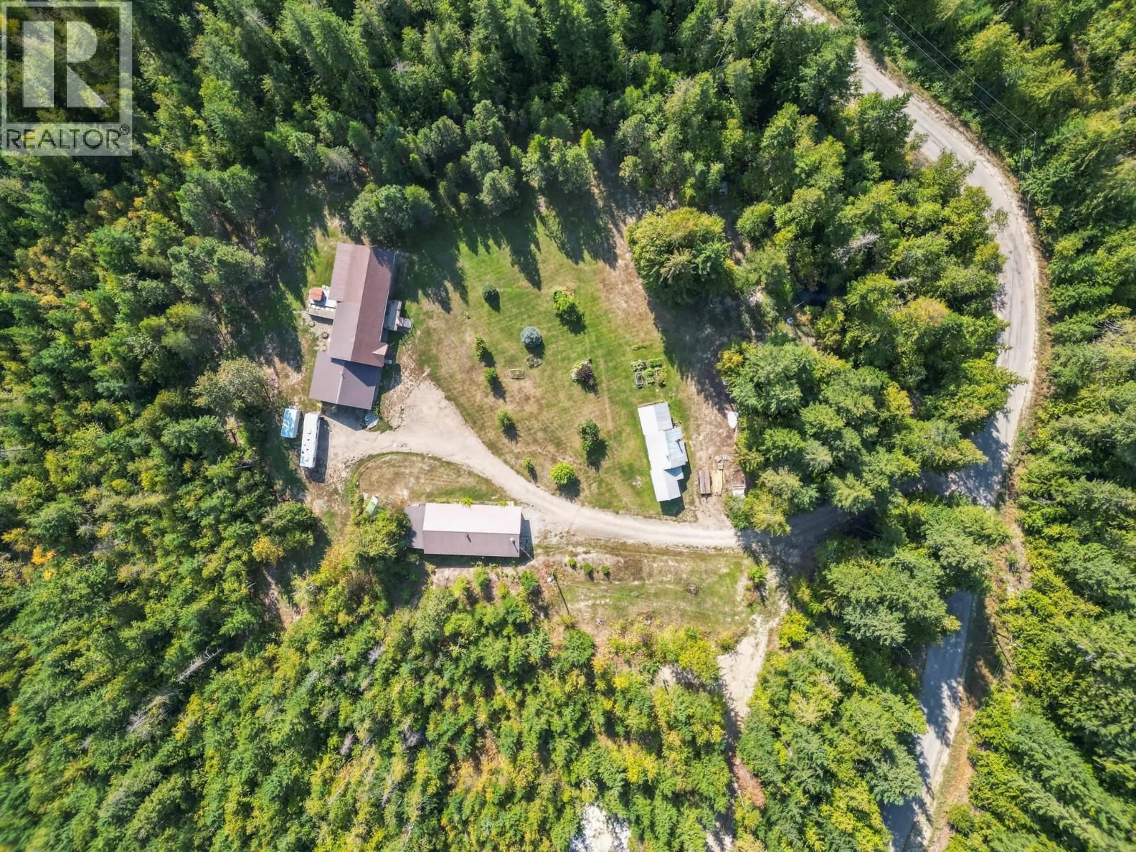 A pic from outside/outdoor area/front of a property/back of a property/a pic from drone, forest/trees view for 2510 SAMUELSON ROAD, Sicamous British Columbia V0E2V5