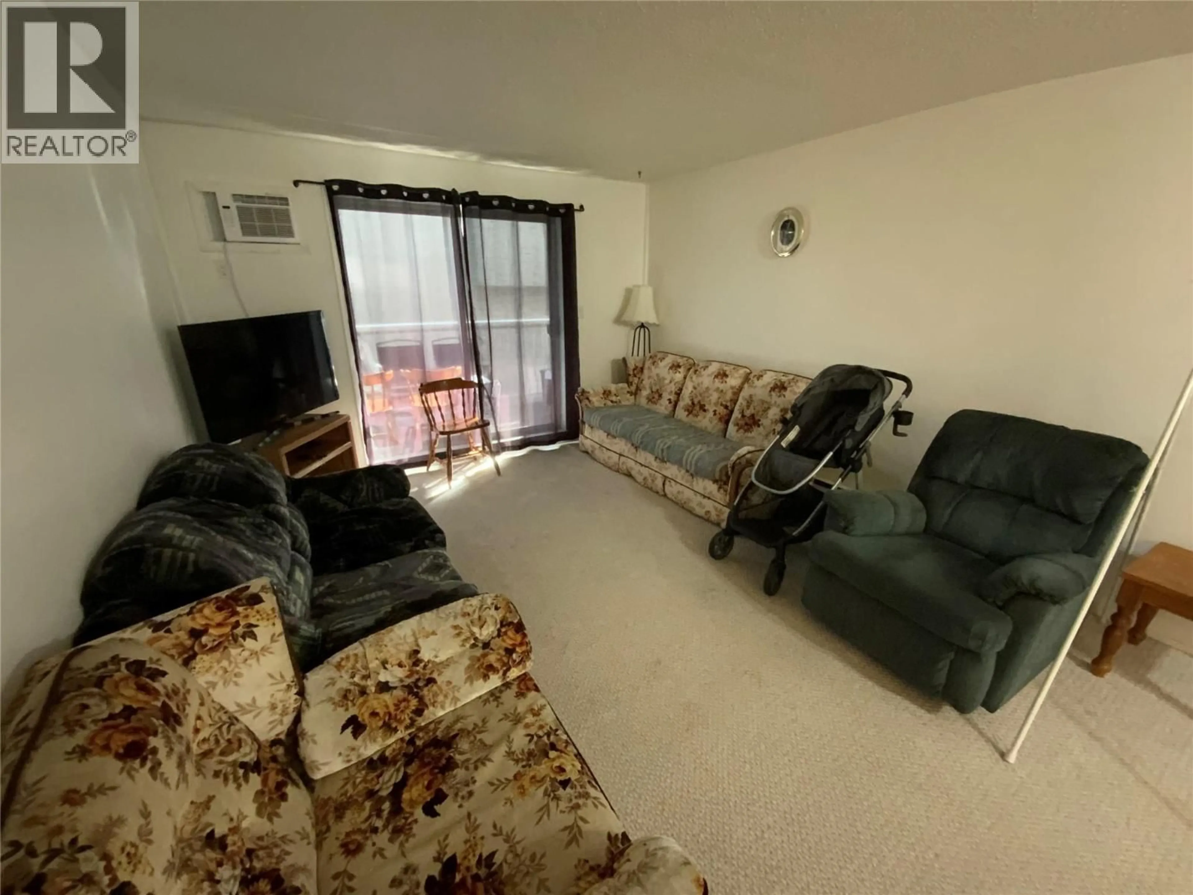 Living room with furniture, unknown for 203 - 803 FAIRVIEW ROAD, Penticton British Columbia V2A5Y7