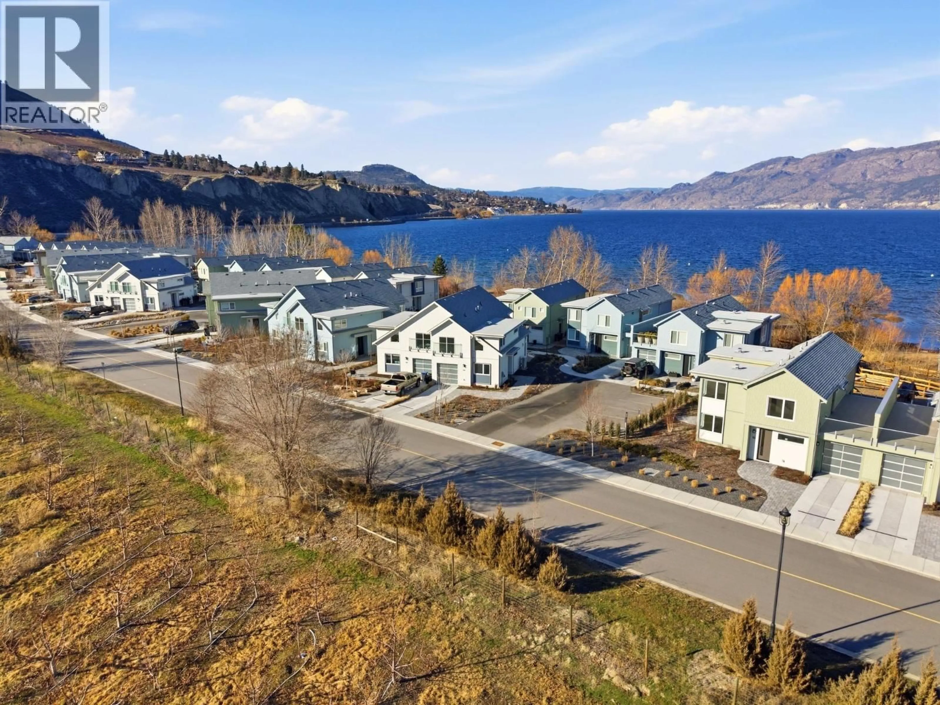 A pic from outside/outdoor area/front of a property/back of a property/a pic from drone, water/lake/river/ocean view for 3000 LANDRY CRESCENT, Summerland British Columbia V0H1Z9