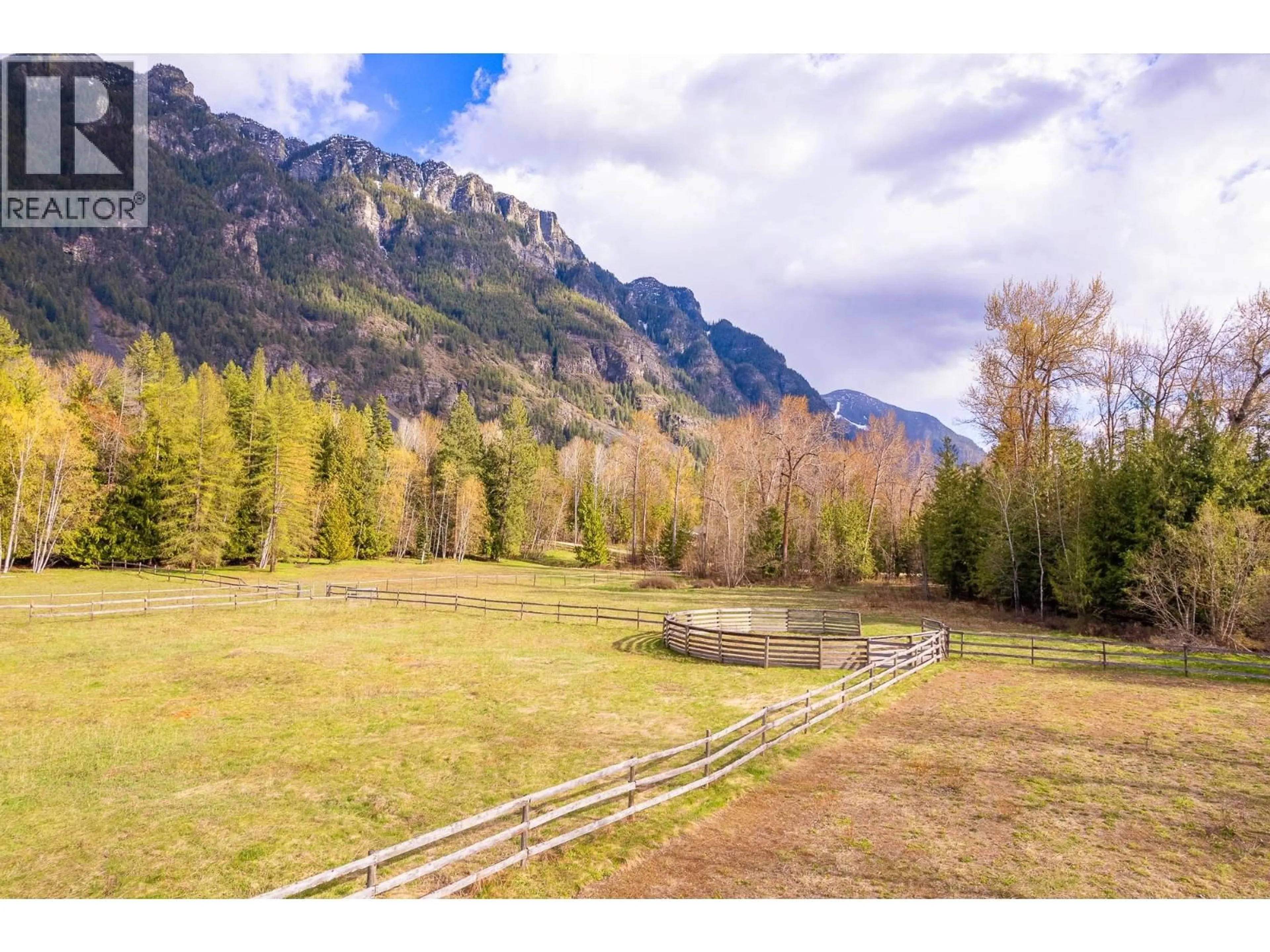 A pic from outside/outdoor area/front of a property/back of a property/a pic from drone, mountain view for 4856 32ND STREET, Canyon British Columbia V0B1C1