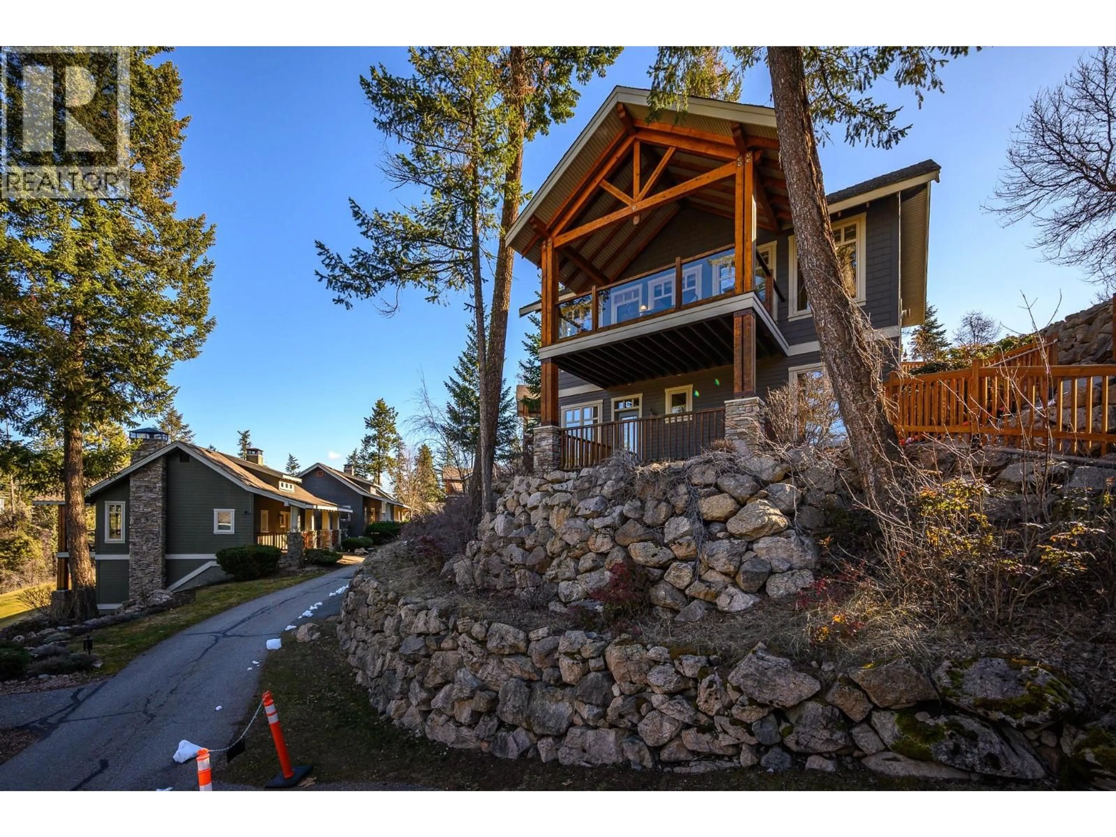 A pic from outside/outdoor area/front of a property/back of a property/a pic from drone, mountain view for 14 - 251 PREDATOR RIDGE DRIVE, Vernon British Columbia V1H1V2