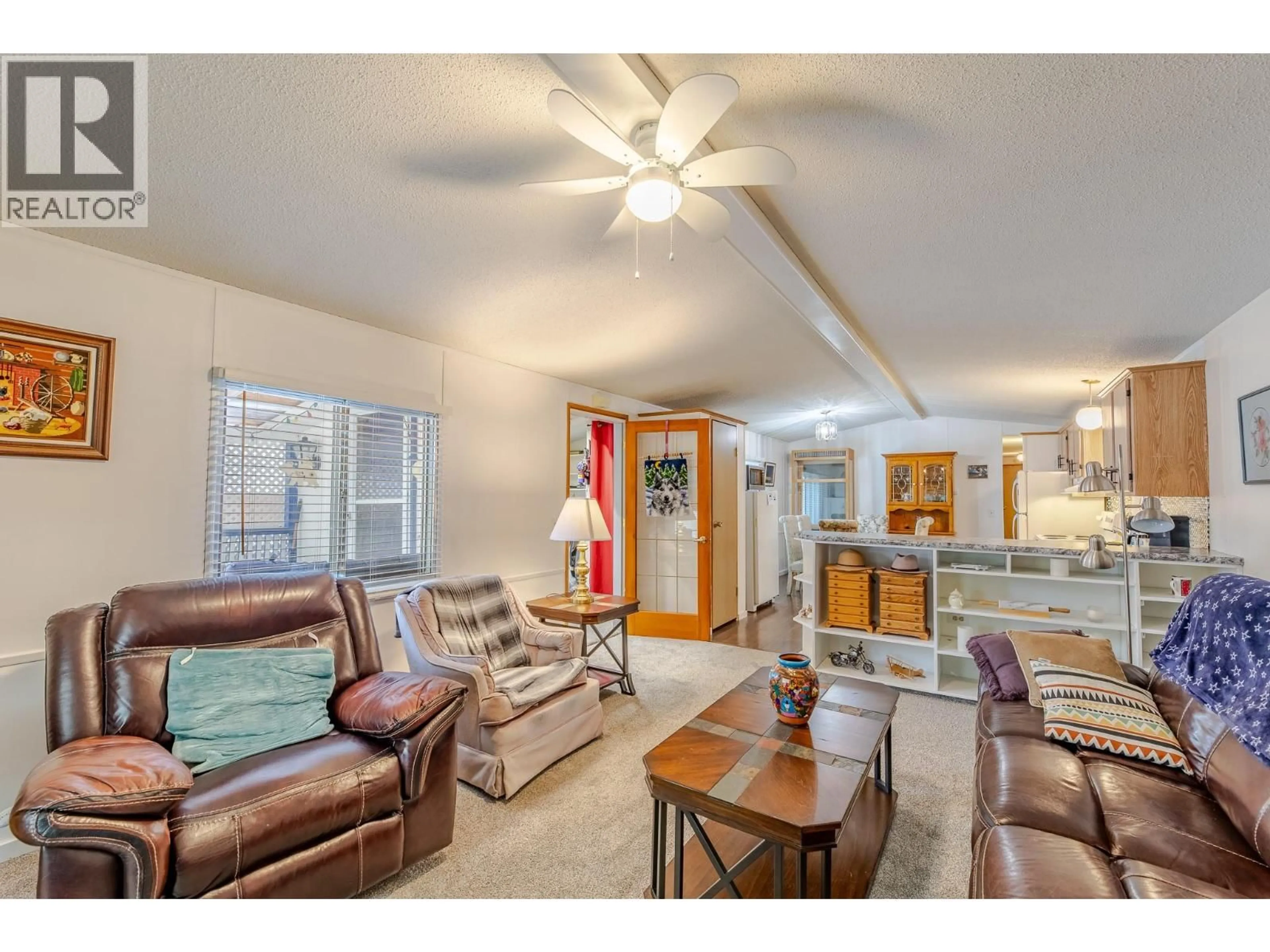 Living room with furniture, unknown for F31 - 4505 MCLEAN CREEK ROAD, Okanagan Falls British Columbia V0H1R1