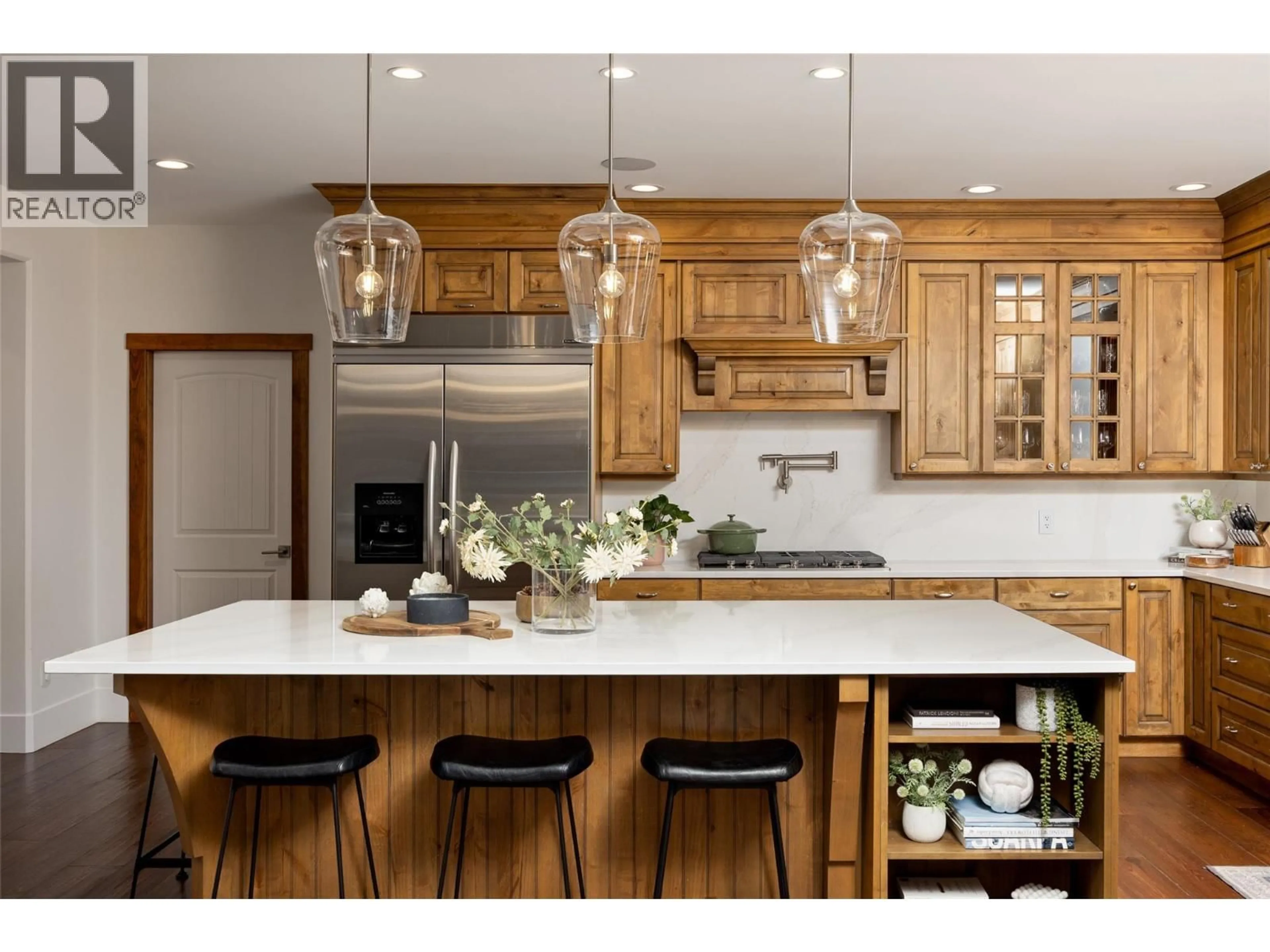 Contemporary kitchen, wood/laminate floor for 1786 MID RIDGE COURT, Kelowna British Columbia V1W4A1