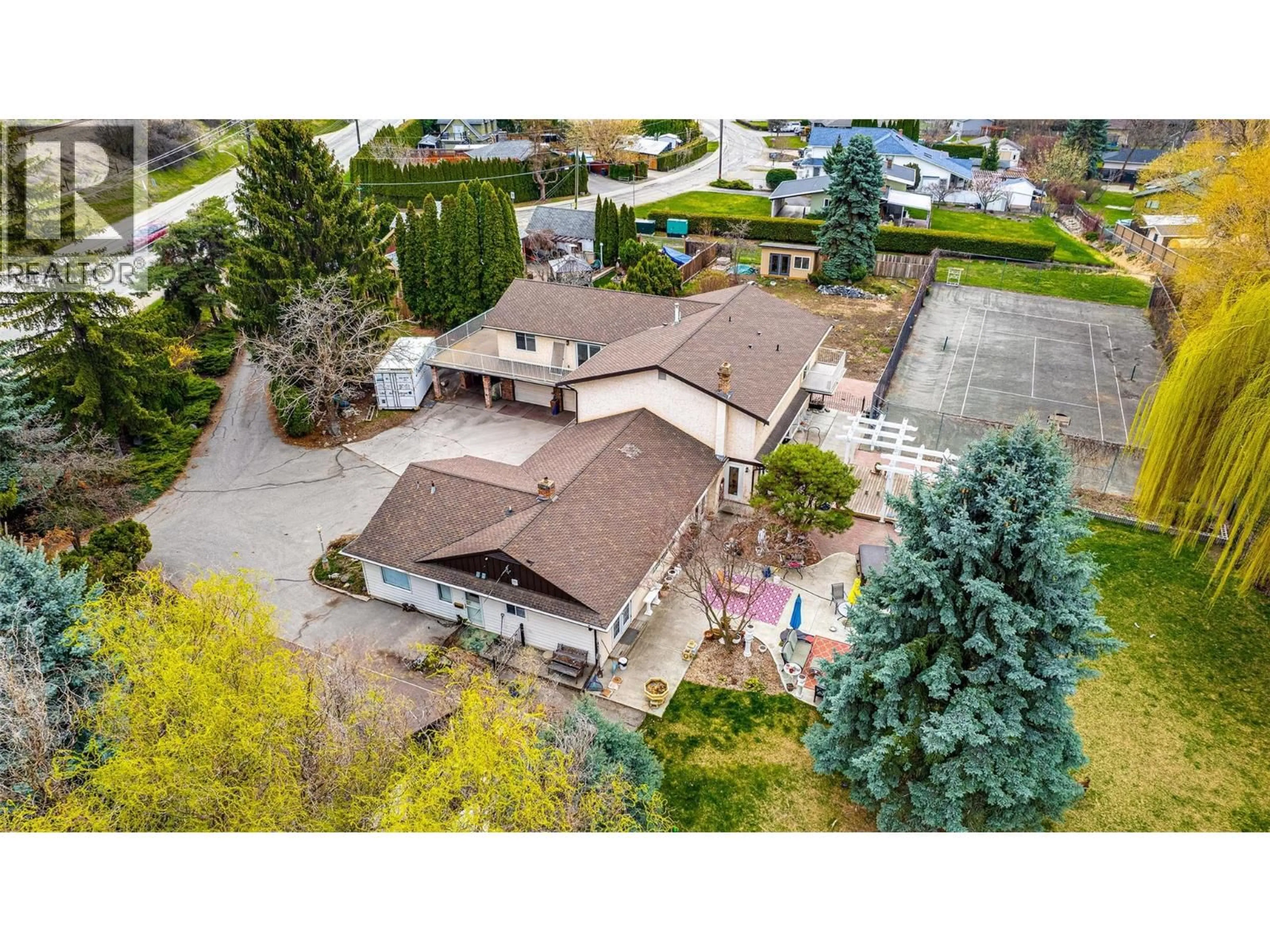 A pic from outside/outdoor area/front of a property/back of a property/a pic from drone, street for 12300 KALAMALKA ROAD, Coldstream British Columbia V1B1M6