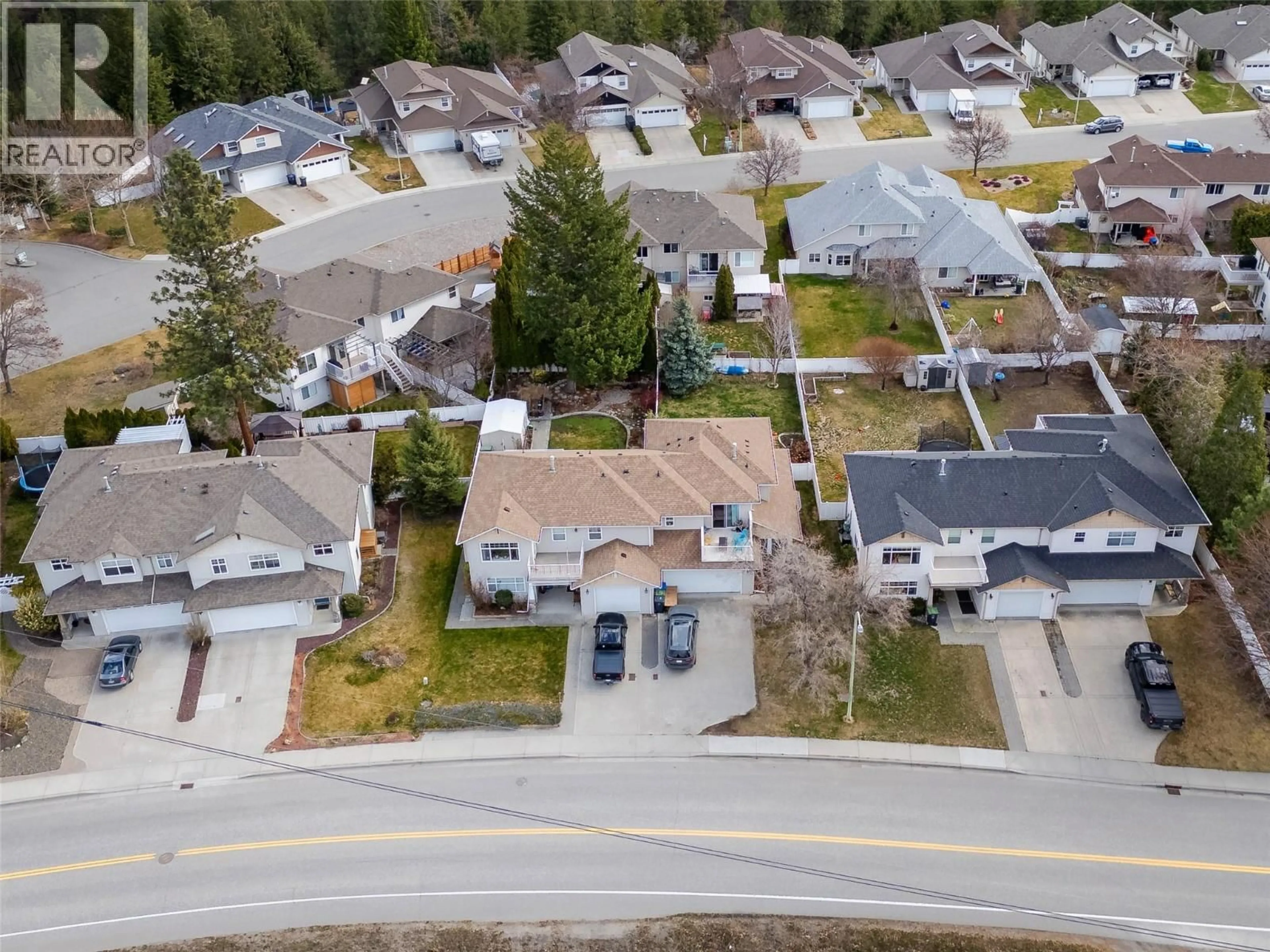 A pic from outside/outdoor area/front of a property/back of a property/a pic from drone, street for 3831 GELLATLY ROAD SOUTH, West Kelowna British Columbia V4T2P7