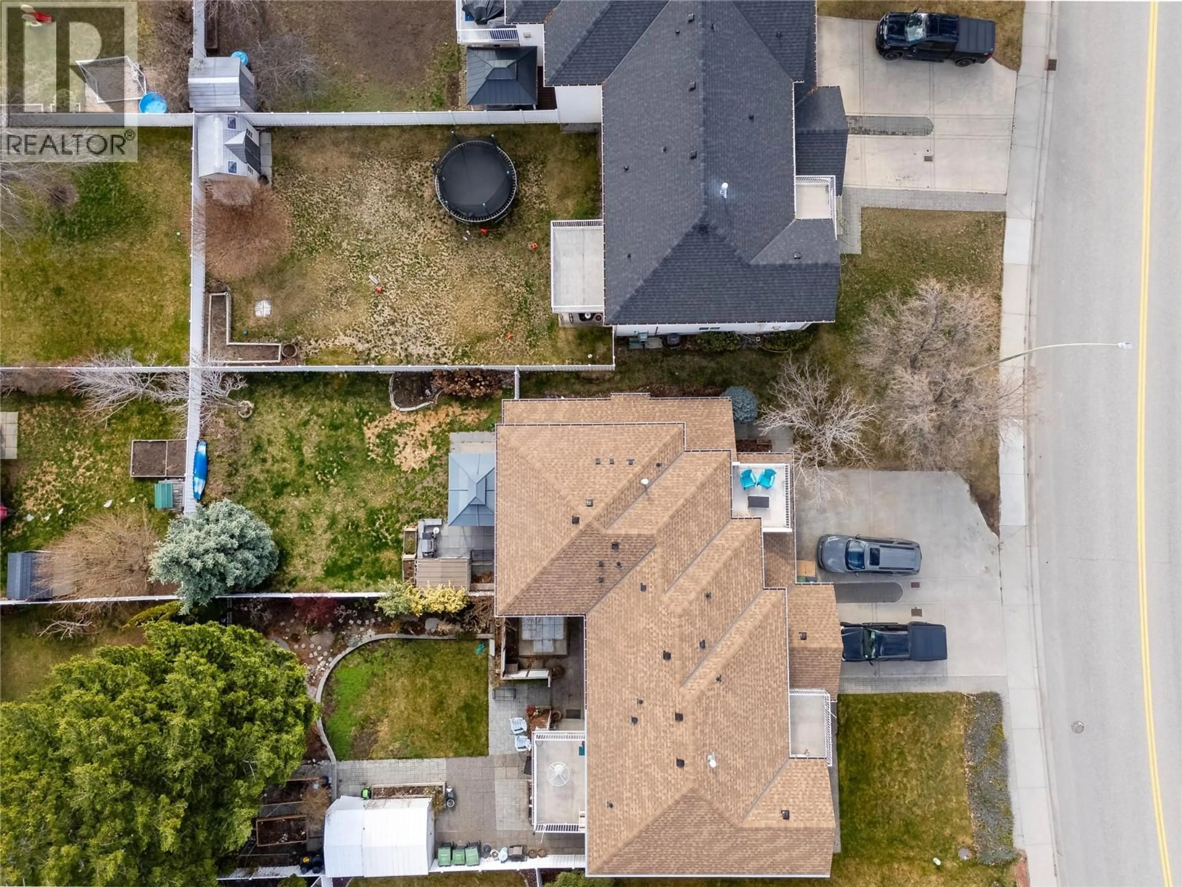 A pic from outside/outdoor area/front of a property/back of a property/a pic from drone, street for 3831 GELLATLY ROAD SOUTH, West Kelowna British Columbia V4T2P7