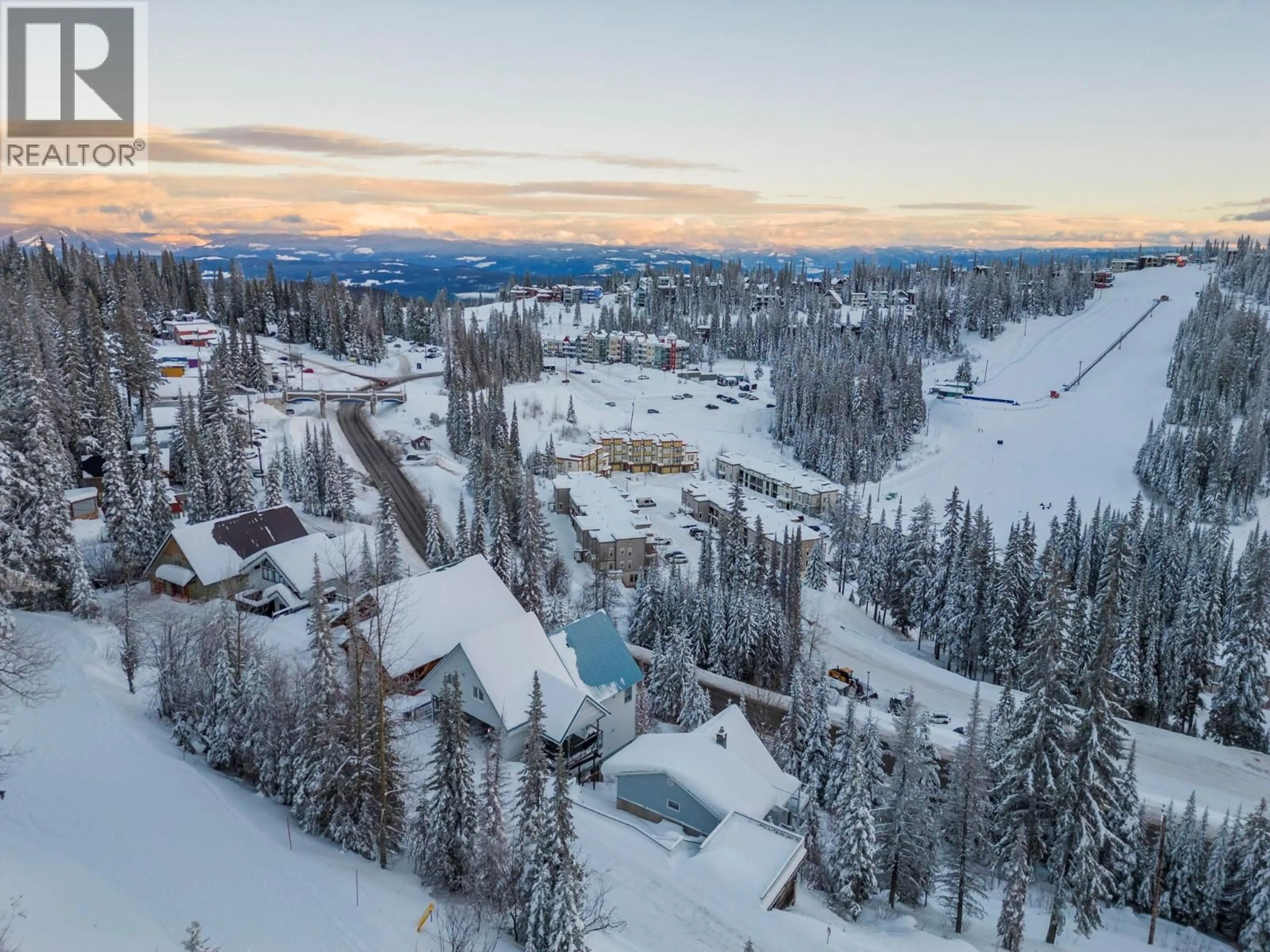 A pic from outside/outdoor area/front of a property/back of a property/a pic from drone, mountain view for 9807A SILVER STAR ROAD, Vernon British Columbia V8S2H9