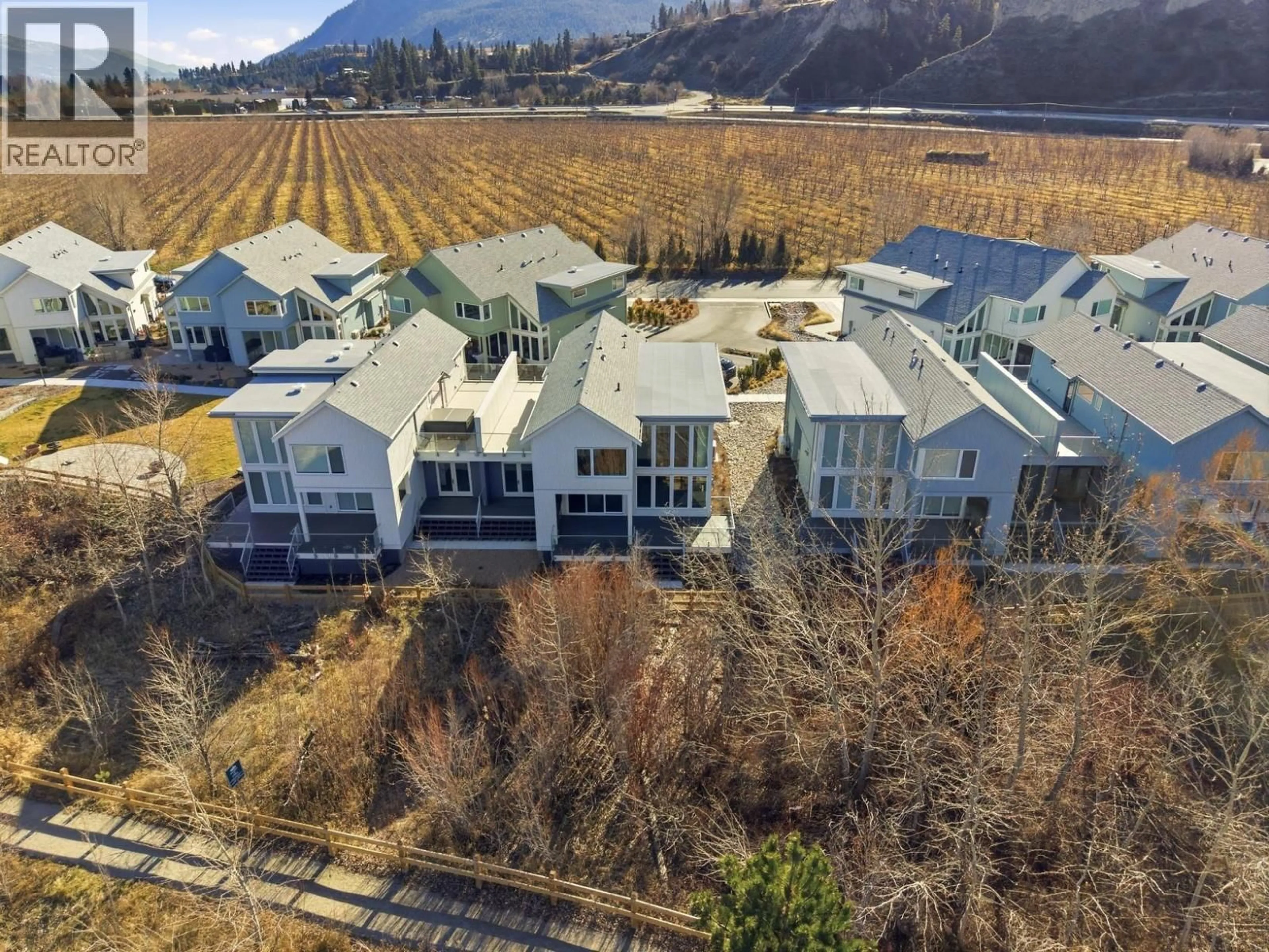 A pic from outside/outdoor area/front of a property/back of a property/a pic from drone, mountain view for 3080 LANDRY CRESCENT, Summerland British Columbia V0H1Z9