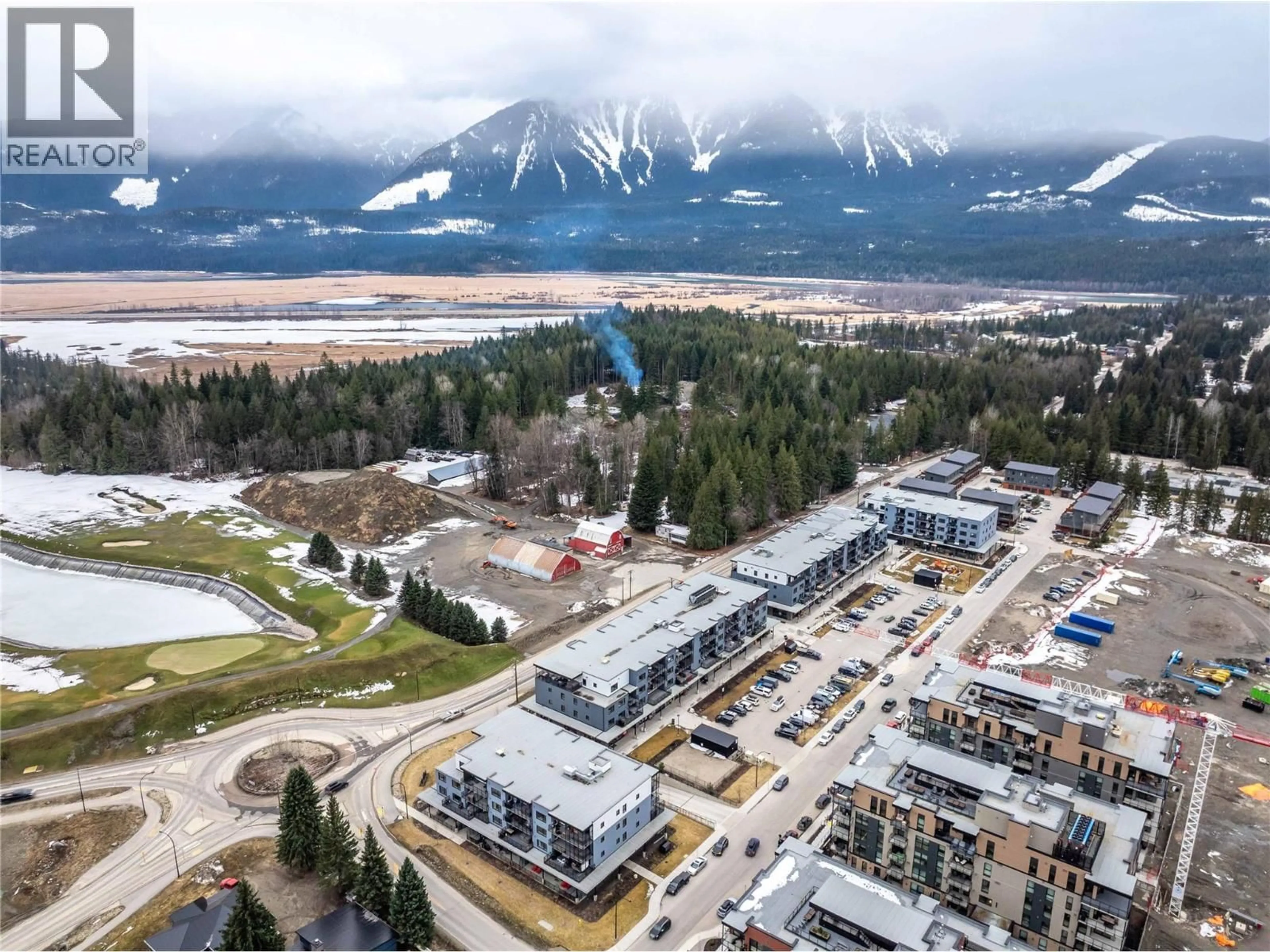 A pic from outside/outdoor area/front of a property/back of a property/a pic from drone, mountain view for 2204 - 1701 COURSIER AVENUE, Revelstoke British Columbia V0E2S3