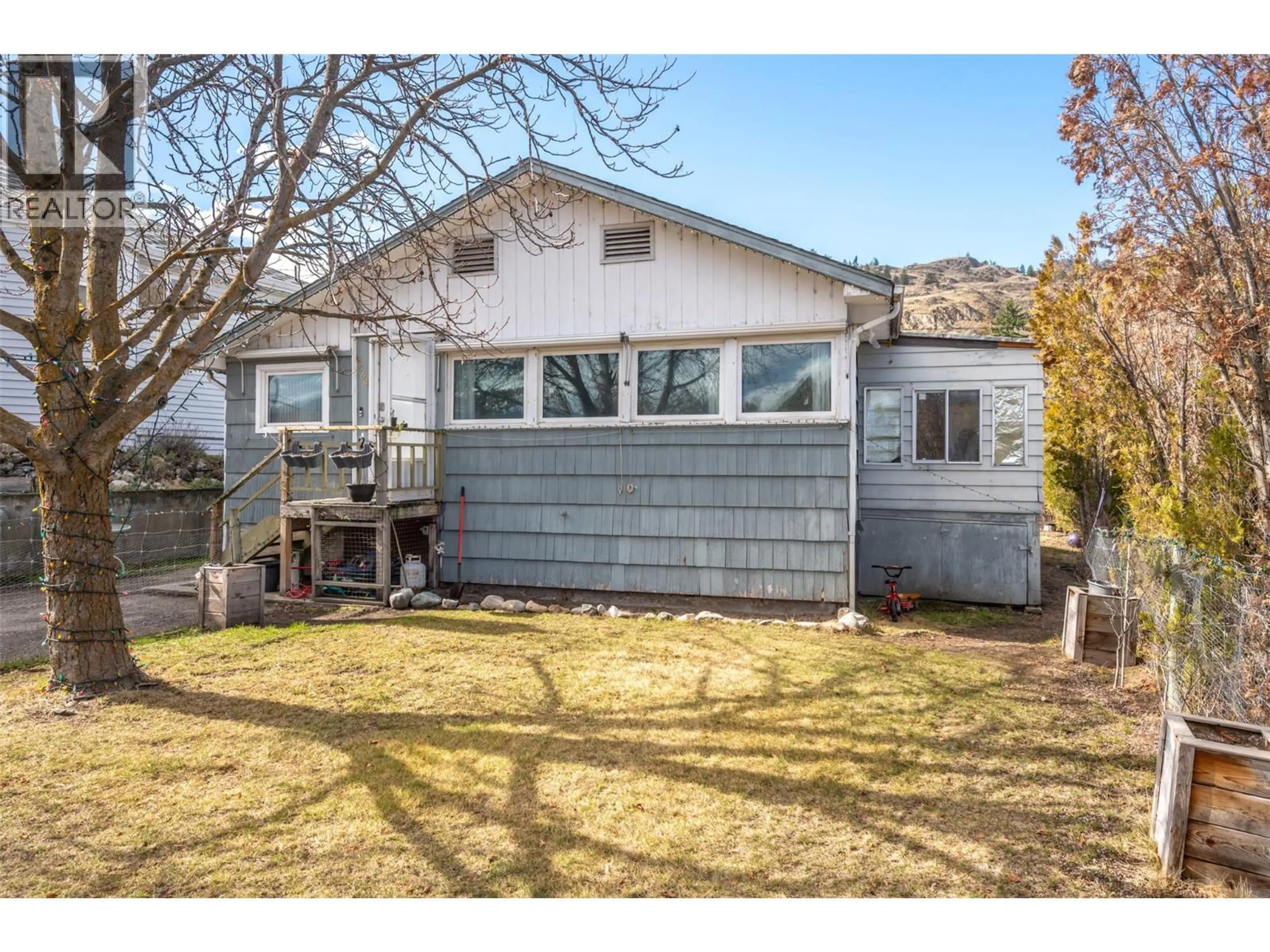 Home with vinyl exterior material, street for 6464 GALA STREET, Oliver British Columbia V0H1T0