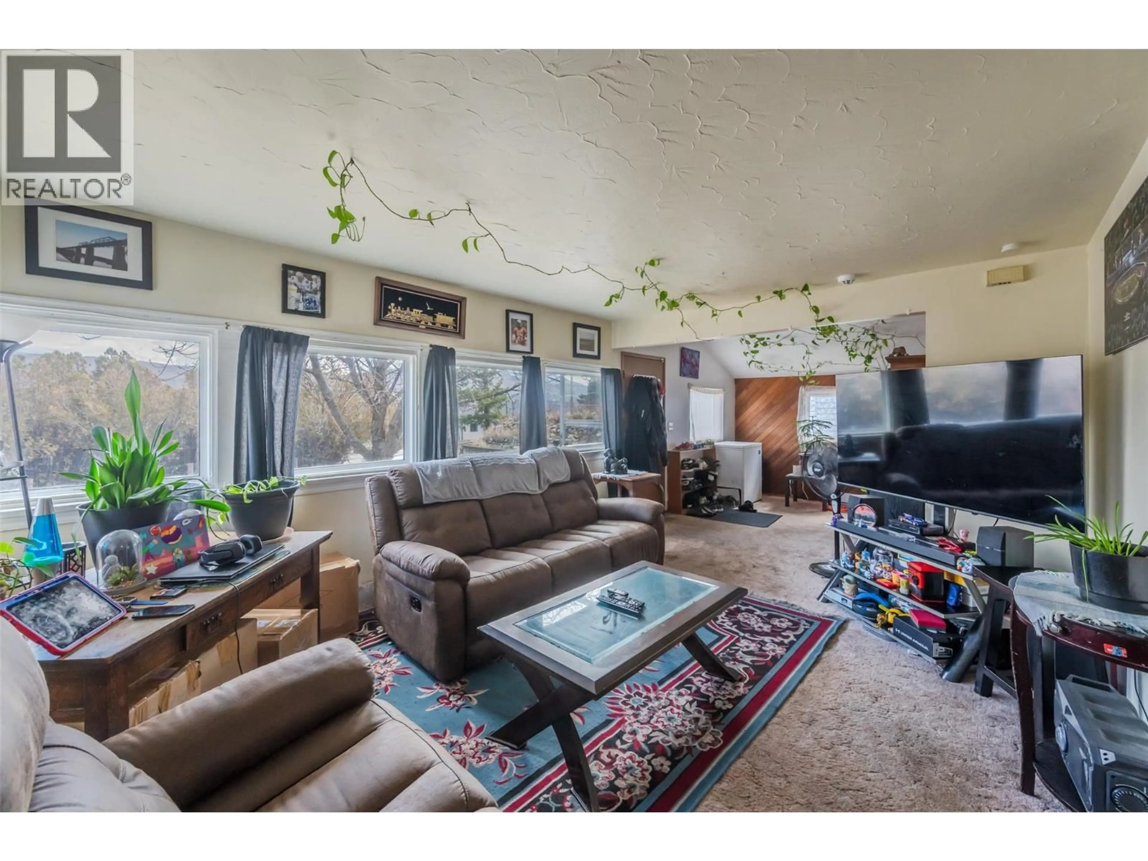 Living room with furniture, unknown for 6464 GALA STREET, Oliver British Columbia V0H1T0
