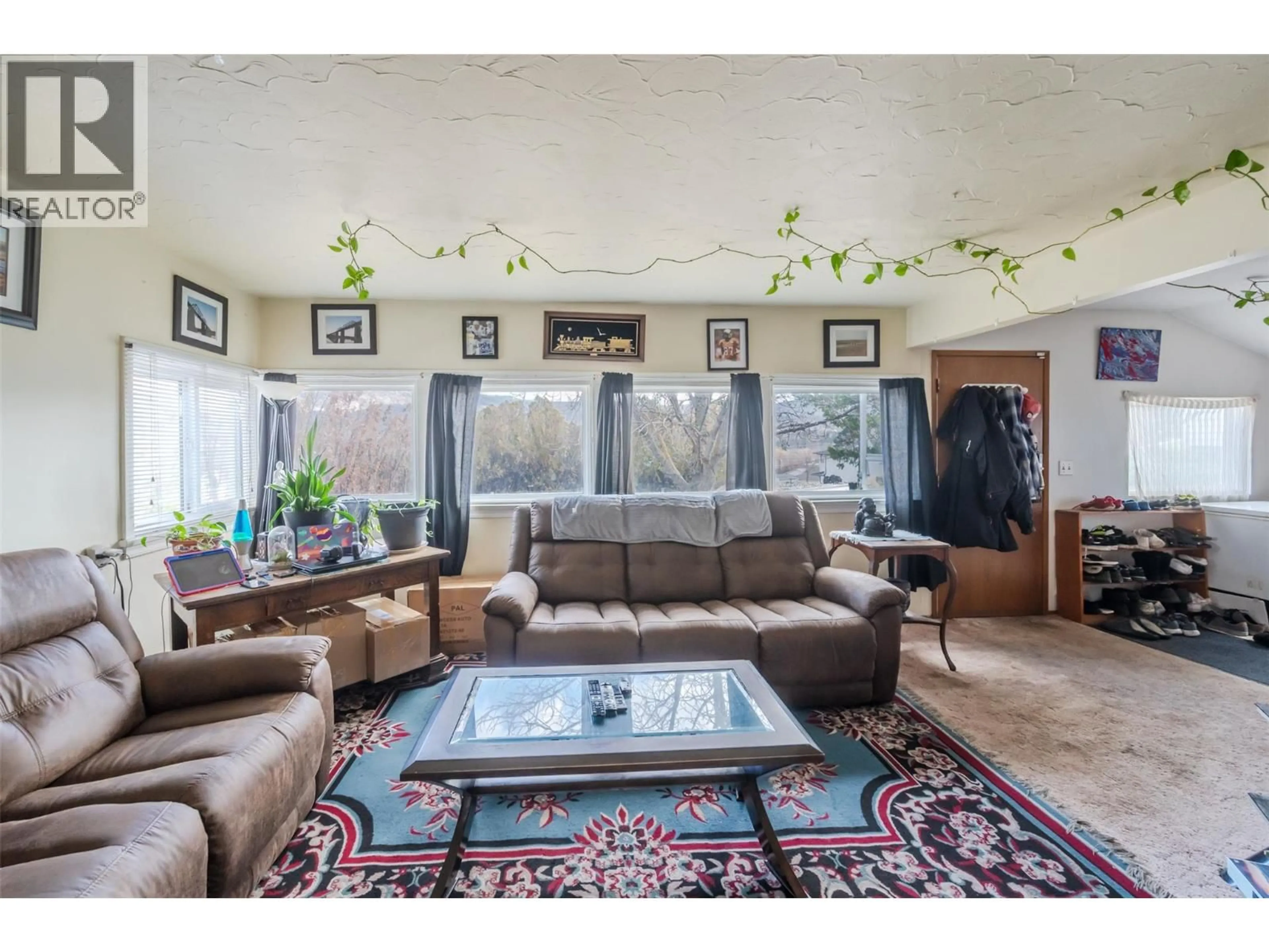Living room with furniture, unknown for 6464 GALA STREET, Oliver British Columbia V0H1T0