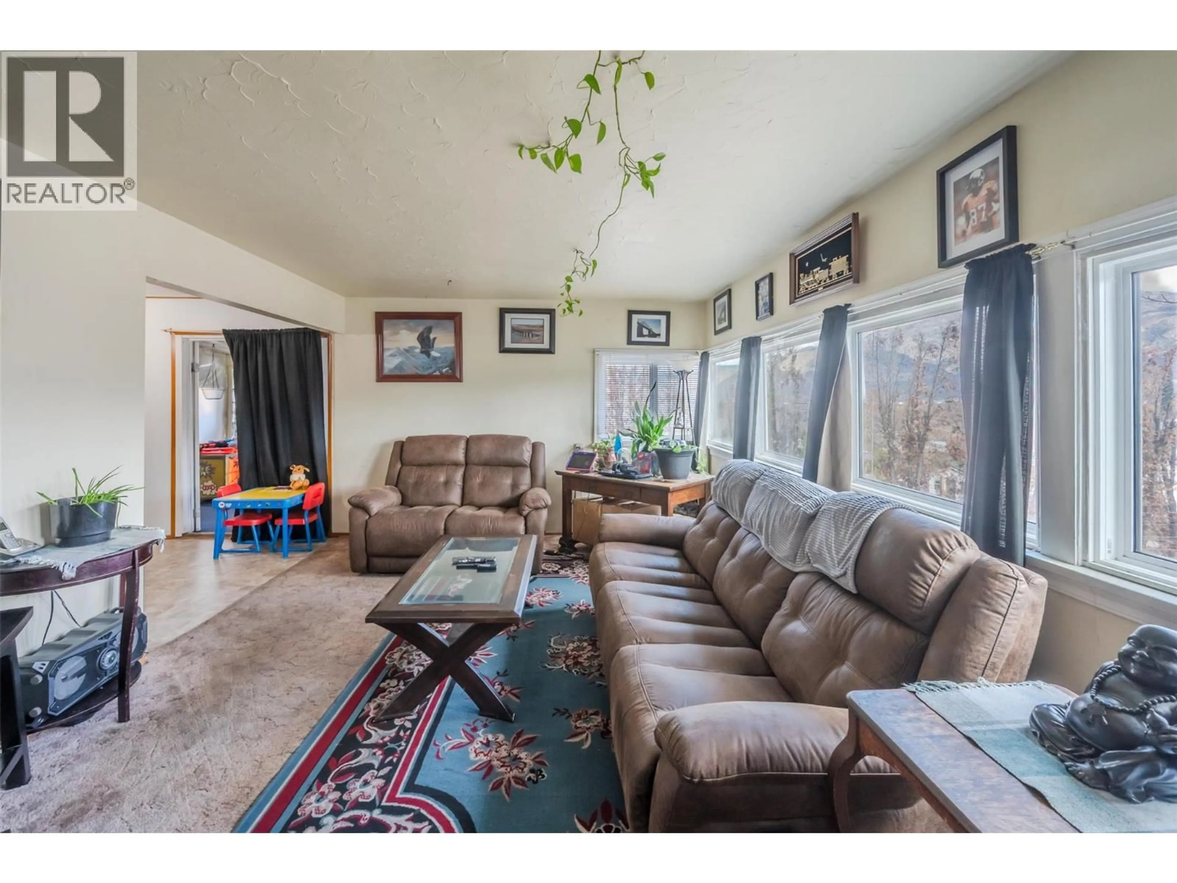 Living room with furniture, unknown for 6464 GALA STREET, Oliver British Columbia V0H1T0