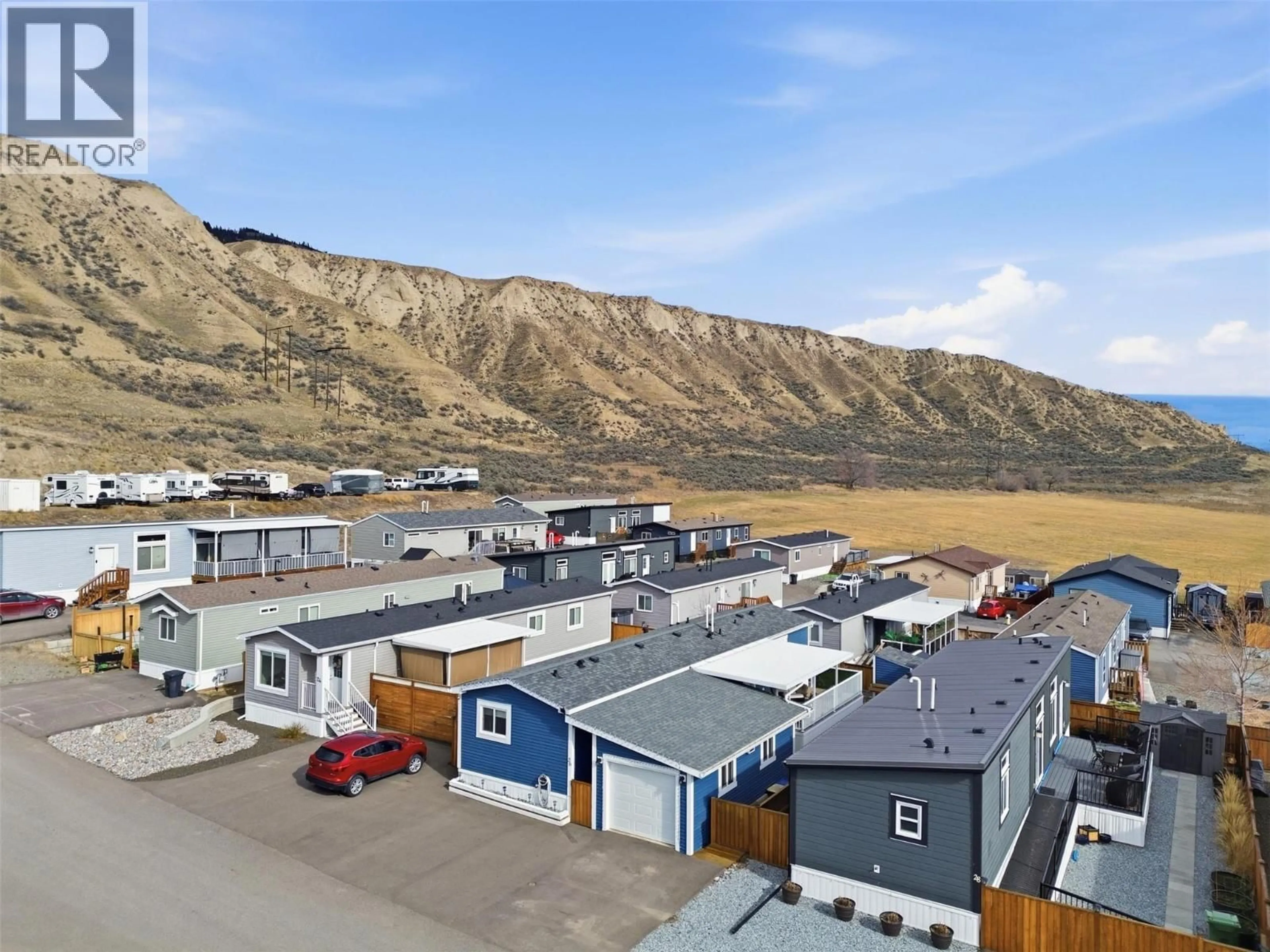 A pic from outside/outdoor area/front of a property/back of a property/a pic from drone, mountain view for 26 - 712 SHUSWAP ROAD EAST, Kamloops British Columbia V2H0C8