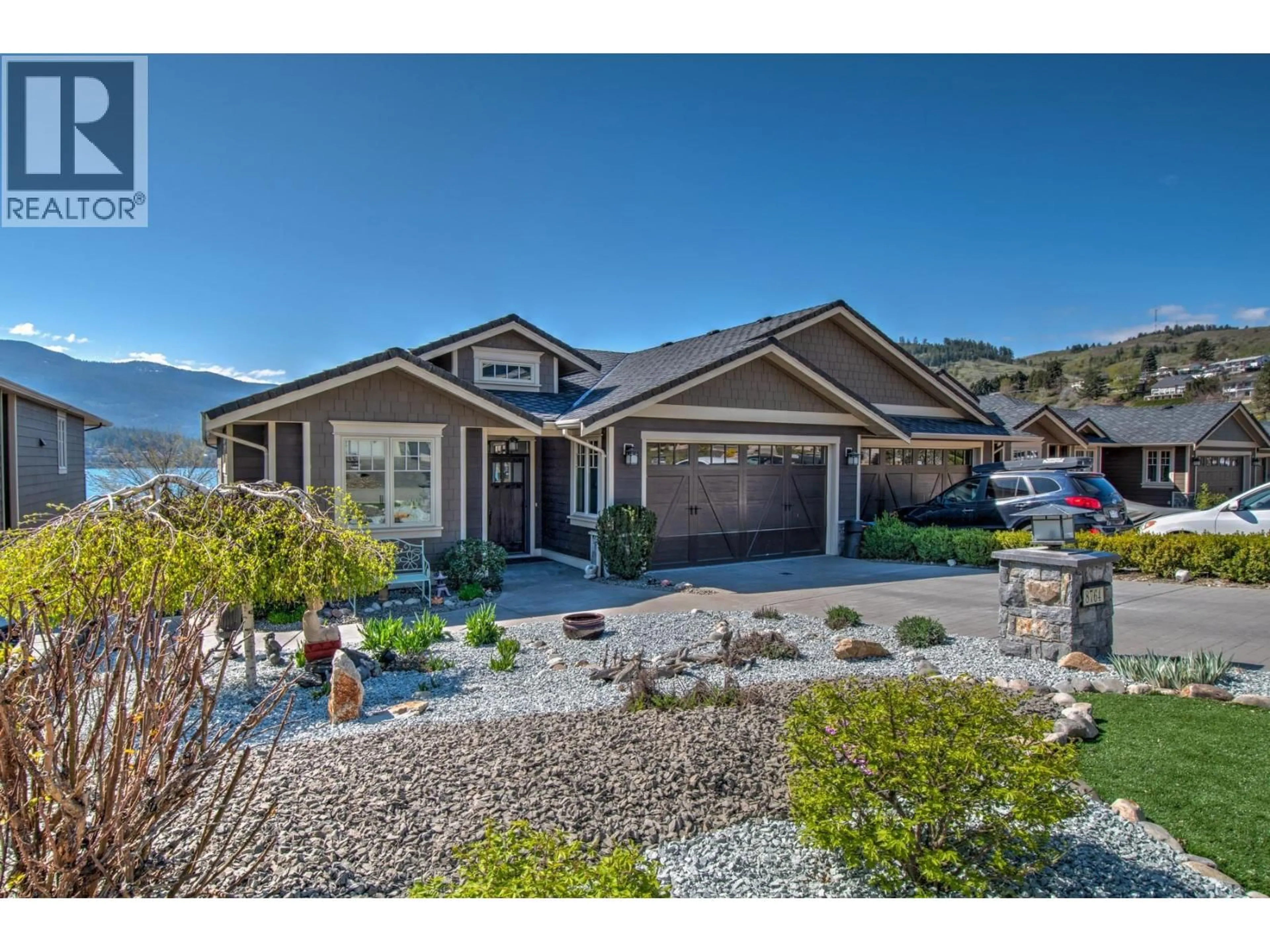 Home with vinyl exterior material, mountain view for 8764 HOFER DRIVE, Coldstream British Columbia V1B1Y8