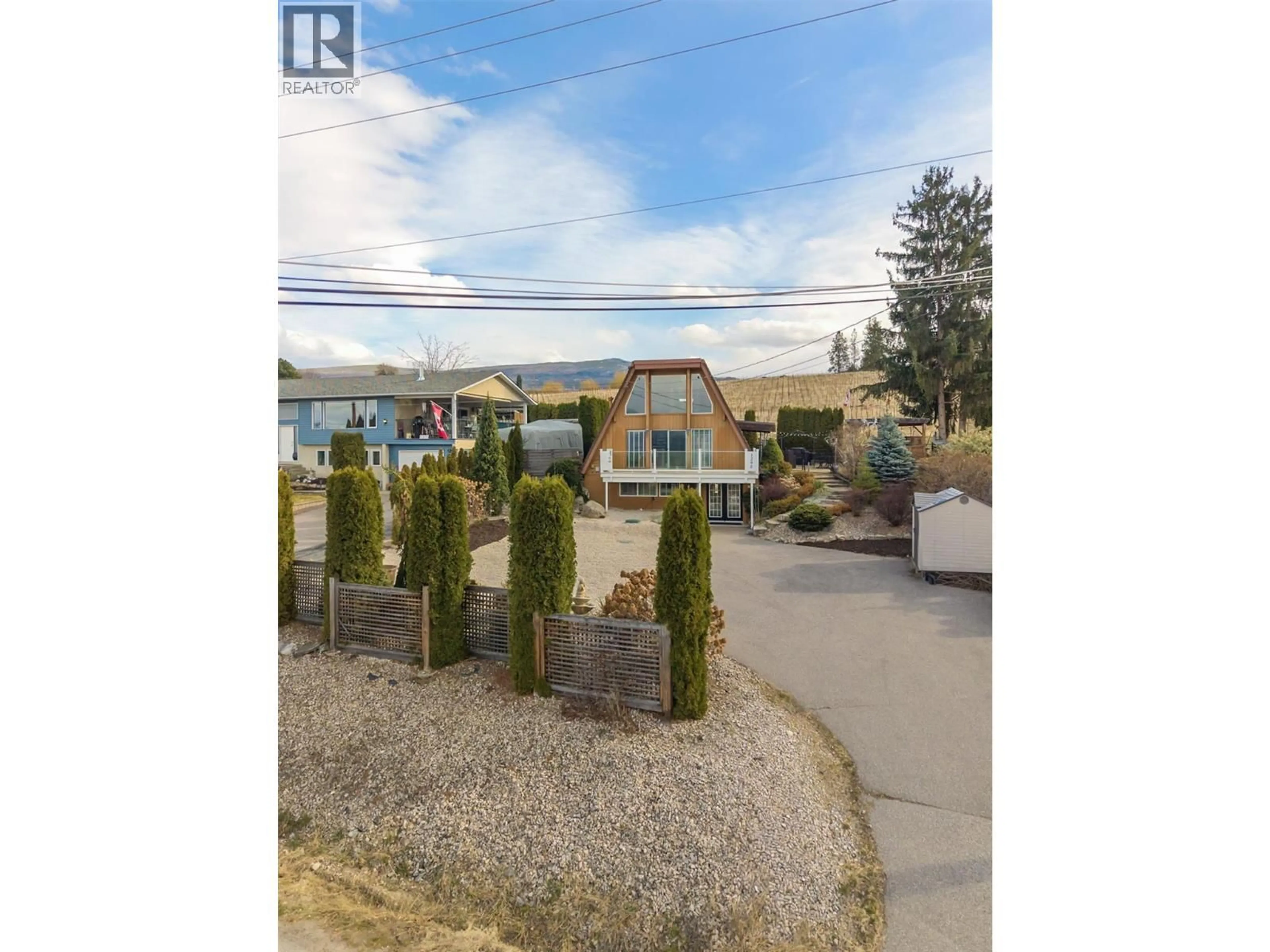 A pic from outside/outdoor area/front of a property/back of a property/a pic from drone, water/lake/river/ocean view for 1295 DEHART ROAD, Kelowna British Columbia V1W4N3