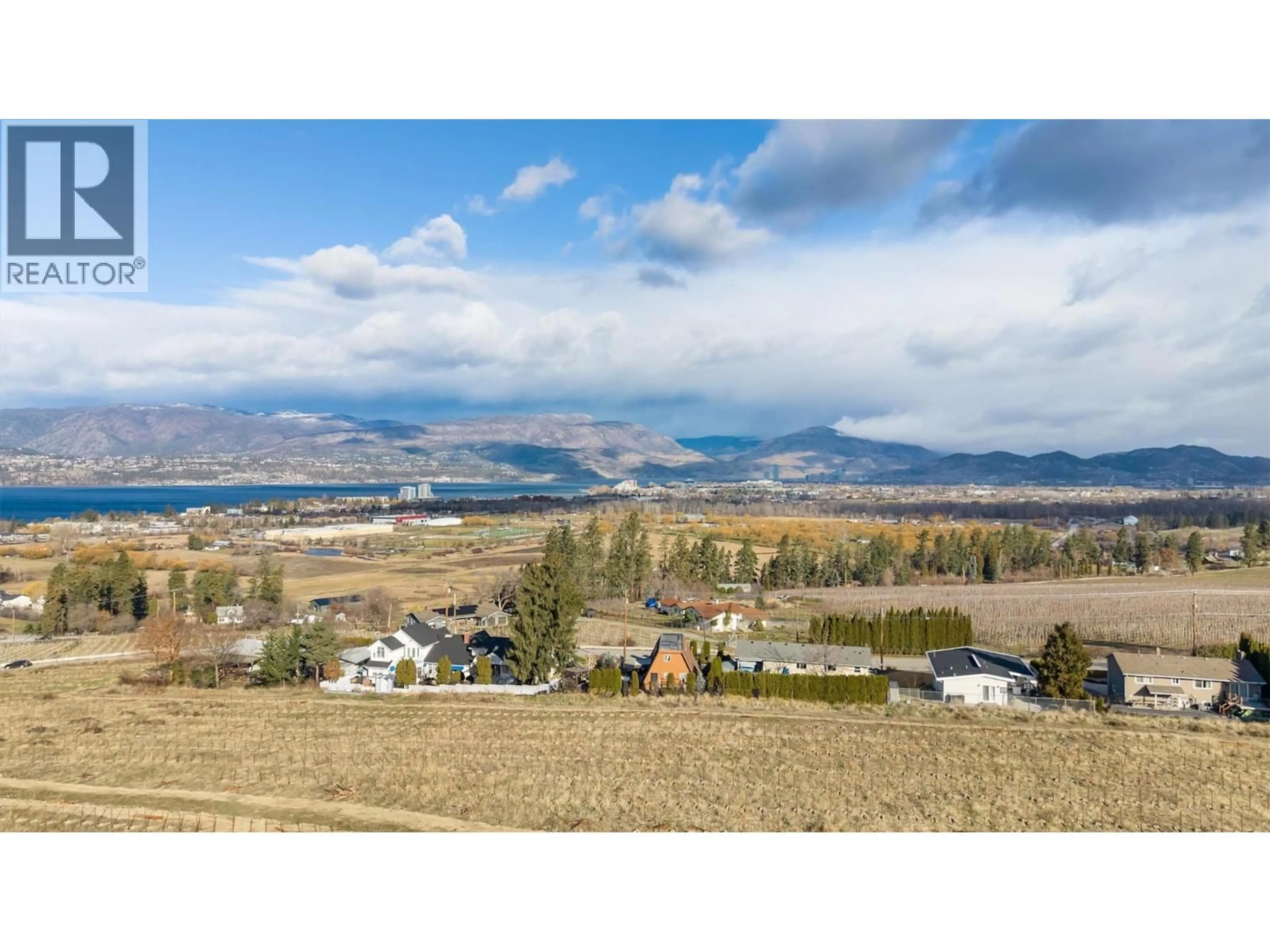 A pic from outside/outdoor area/front of a property/back of a property/a pic from drone, mountain view for 1295 DEHART ROAD, Kelowna British Columbia V1W4N3