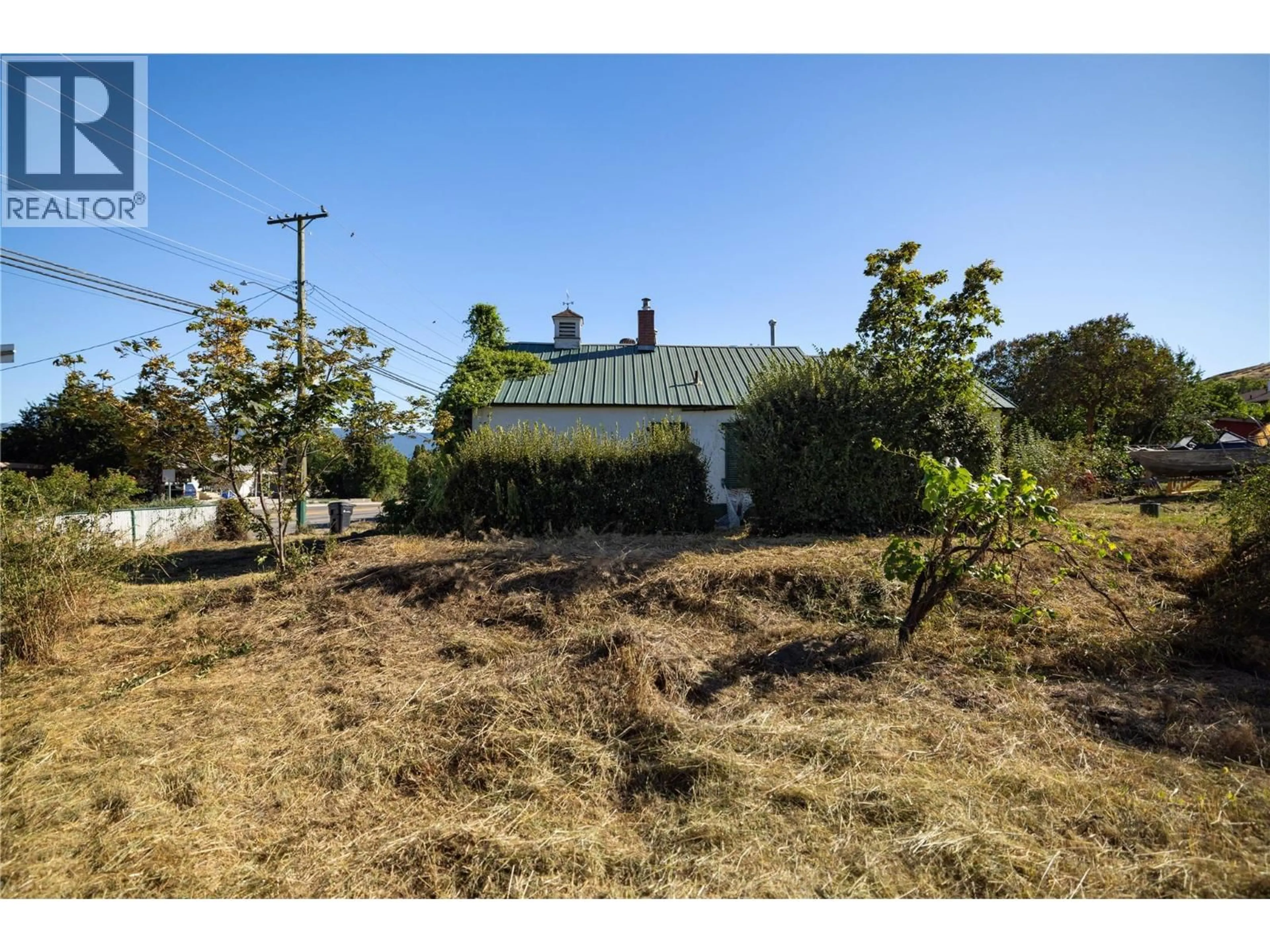 A pic from outside/outdoor area/front of a property/back of a property/a pic from drone, street for 3902 ALEXIS PARK DRIVE, Vernon British Columbia V1T6G9