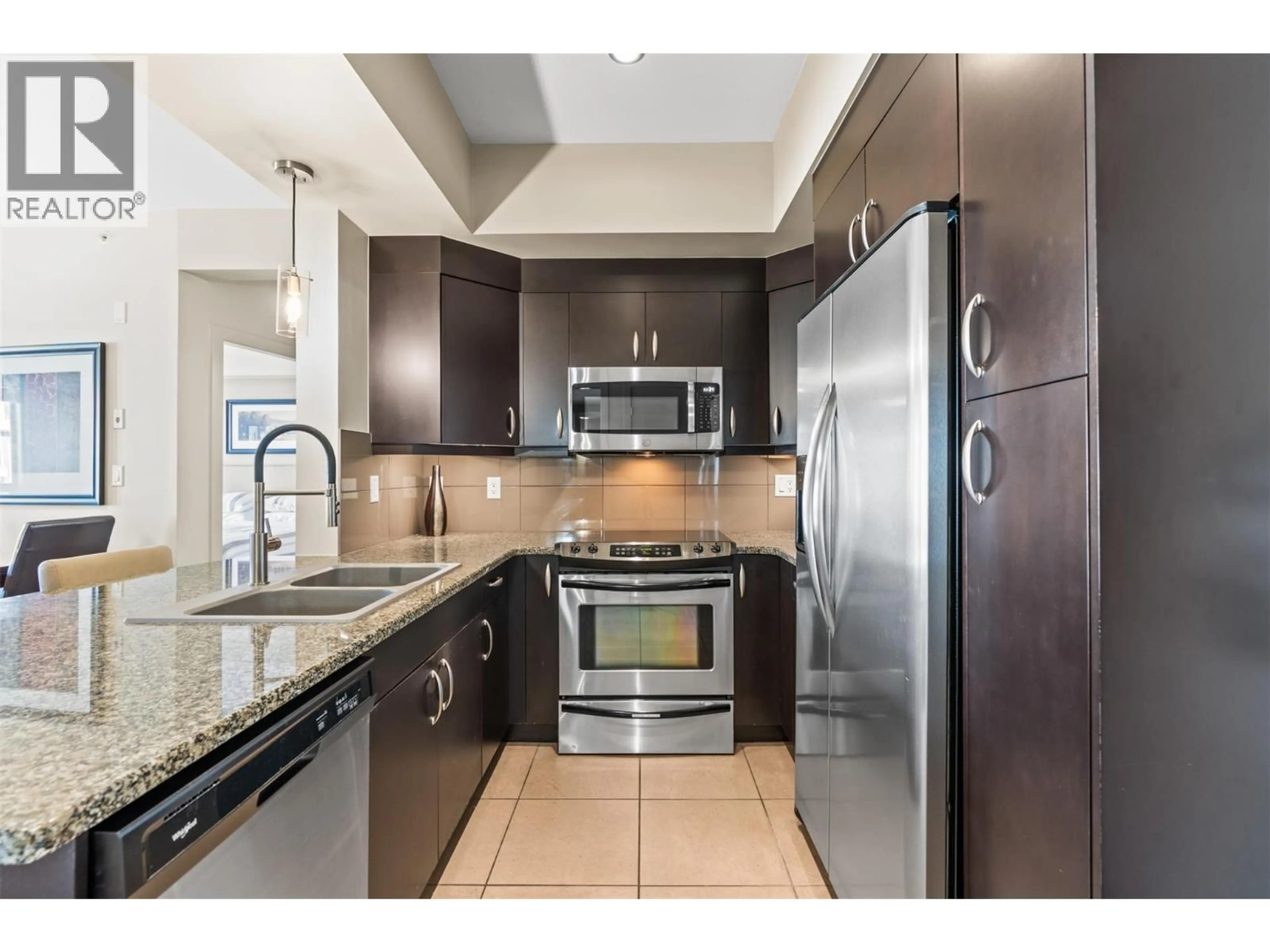 Standard kitchen, ceramic/tile floor for 2401 - 7343 OKANAGAN LANDING ROAD, Vernon British Columbia V1H2J6