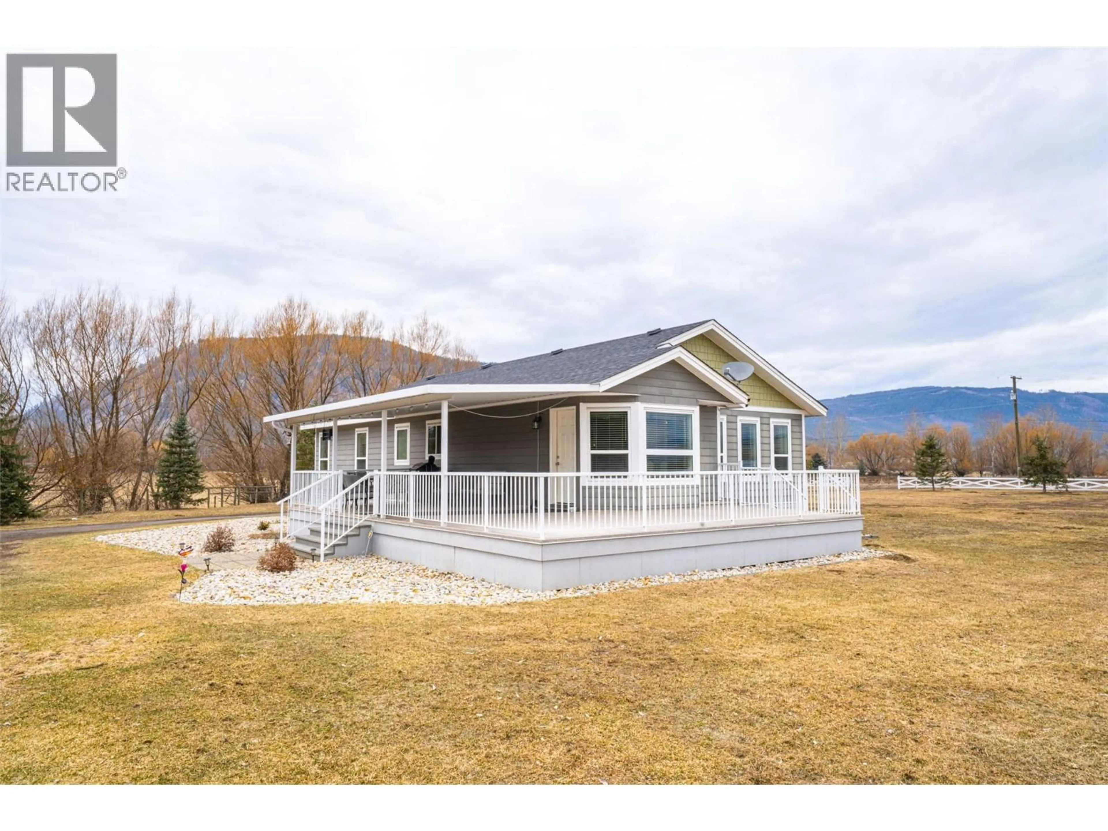 Home with vinyl exterior material, water/lake/river/ocean view for 64 BLOOM ROAD, Lumby British Columbia V0E2G7