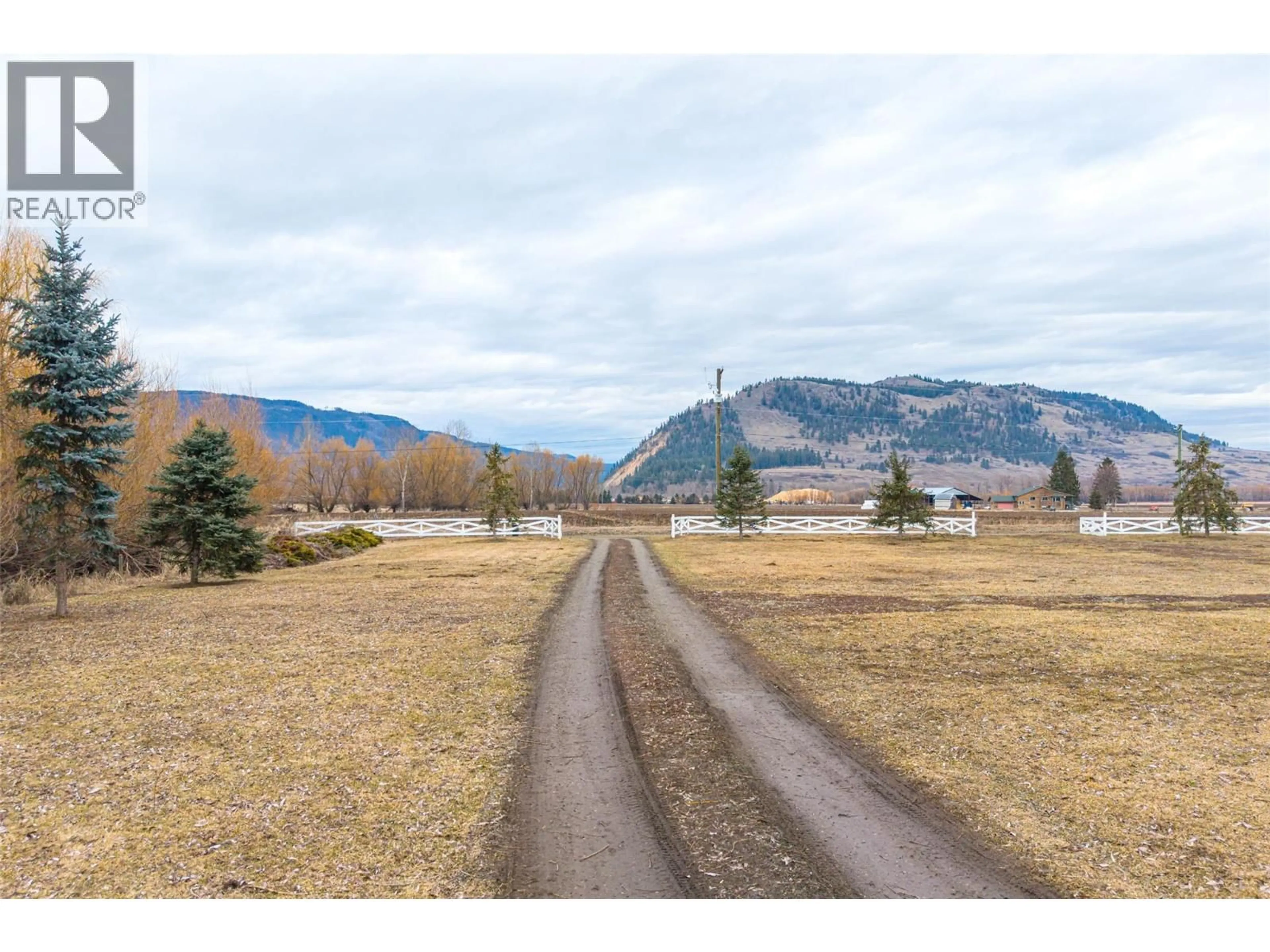 A pic from outside/outdoor area/front of a property/back of a property/a pic from drone, mountain view for 64 BLOOM ROAD, Lumby British Columbia V0E2G7