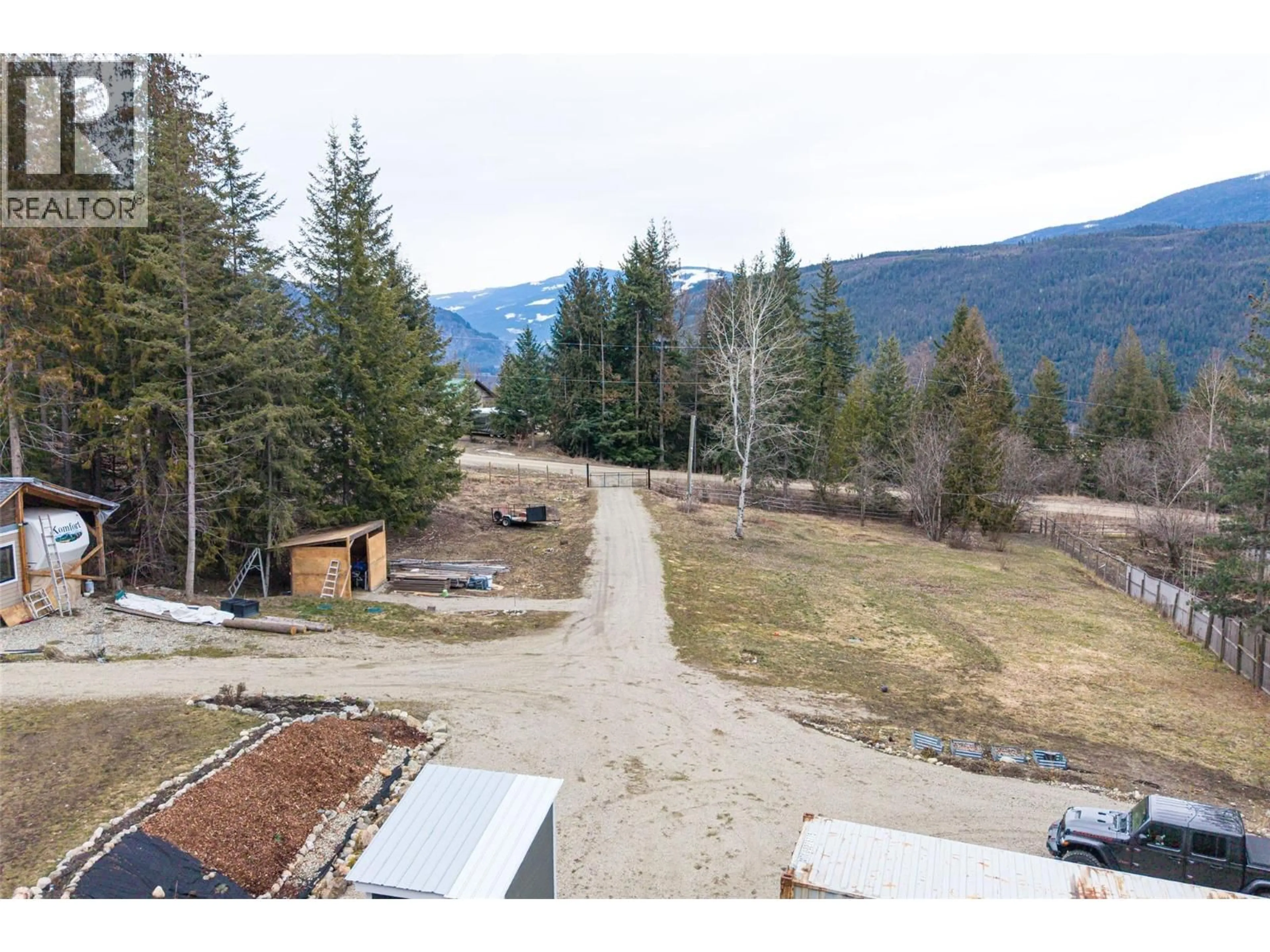 A pic from outside/outdoor area/front of a property/back of a property/a pic from drone, mountain view for 2655 COWAN ROAD, Sicamous British Columbia V0E2V0