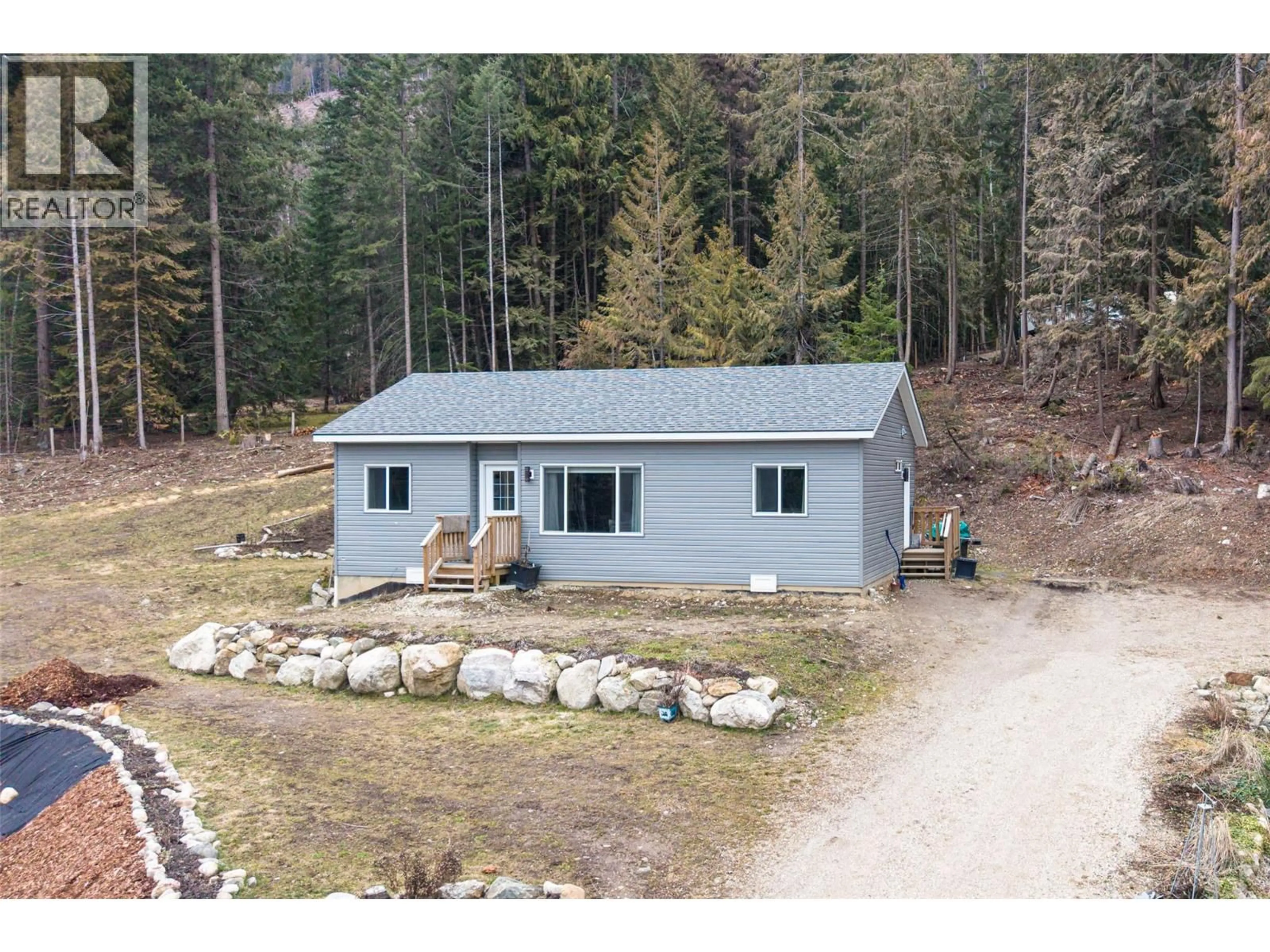 A pic from outside/outdoor area/front of a property/back of a property/a pic from drone, building for 2655 COWAN ROAD, Sicamous British Columbia V0E2V0