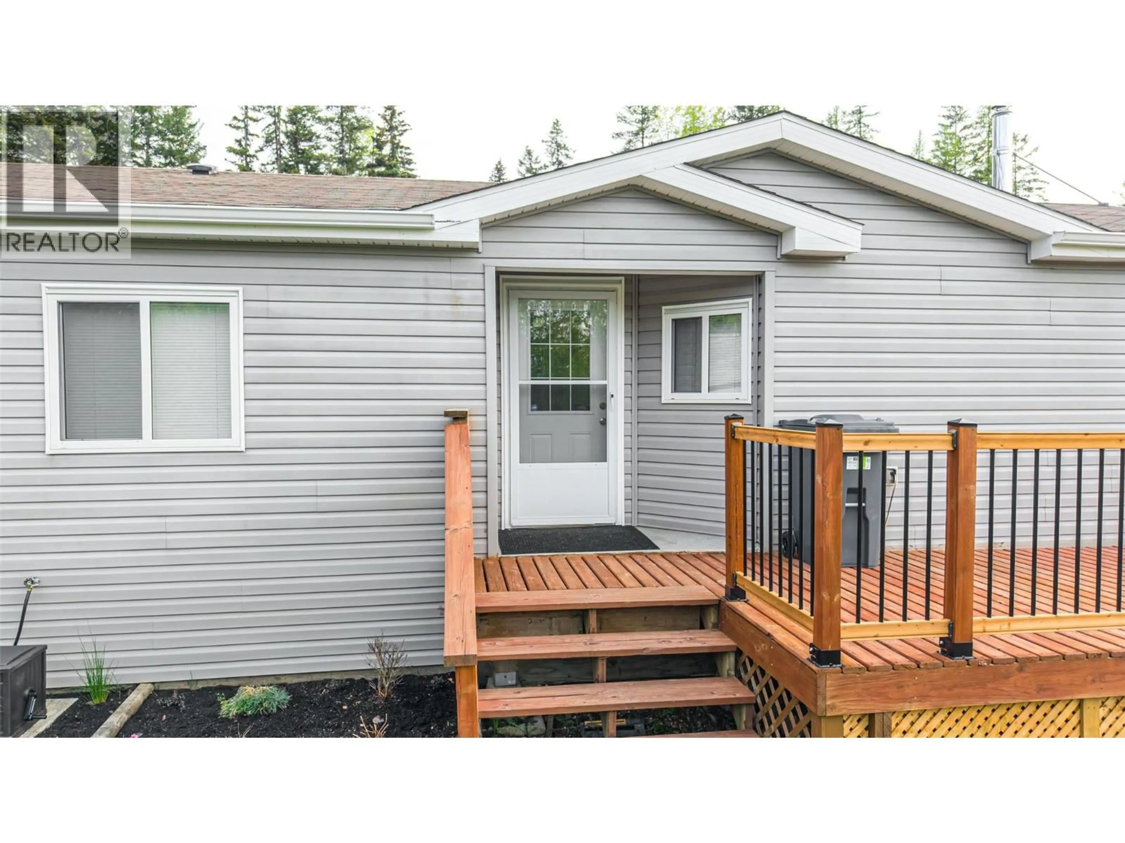 Home with vinyl exterior material, street for 650 BLUENOSE ROAD, Vernon British Columbia V1B3E7